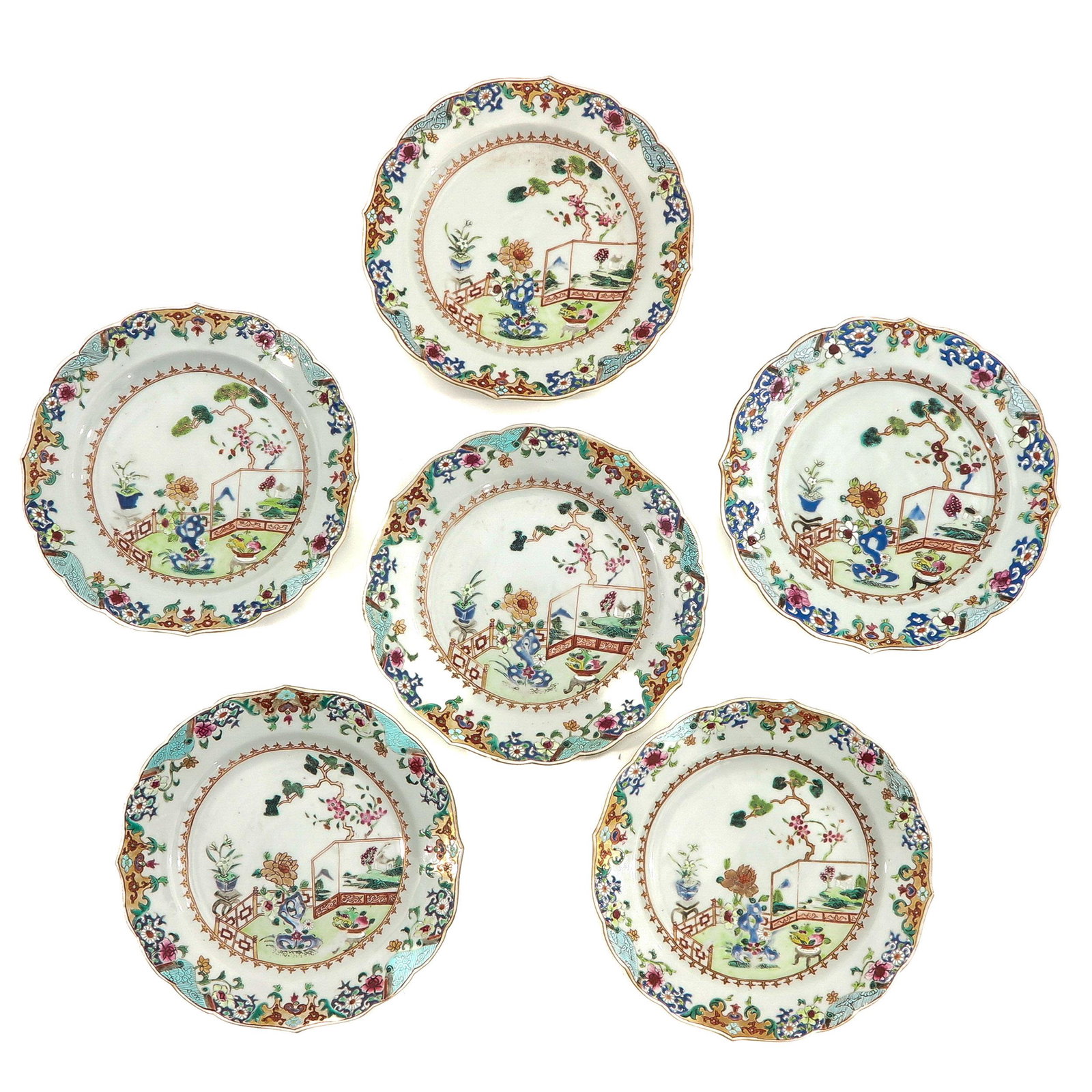 A Series of 6 Famille Rose Plates: Decorated with flowers and Chinese Antiquities in garden, 18th Century, 23 cm. in diameter, chip and hairline.