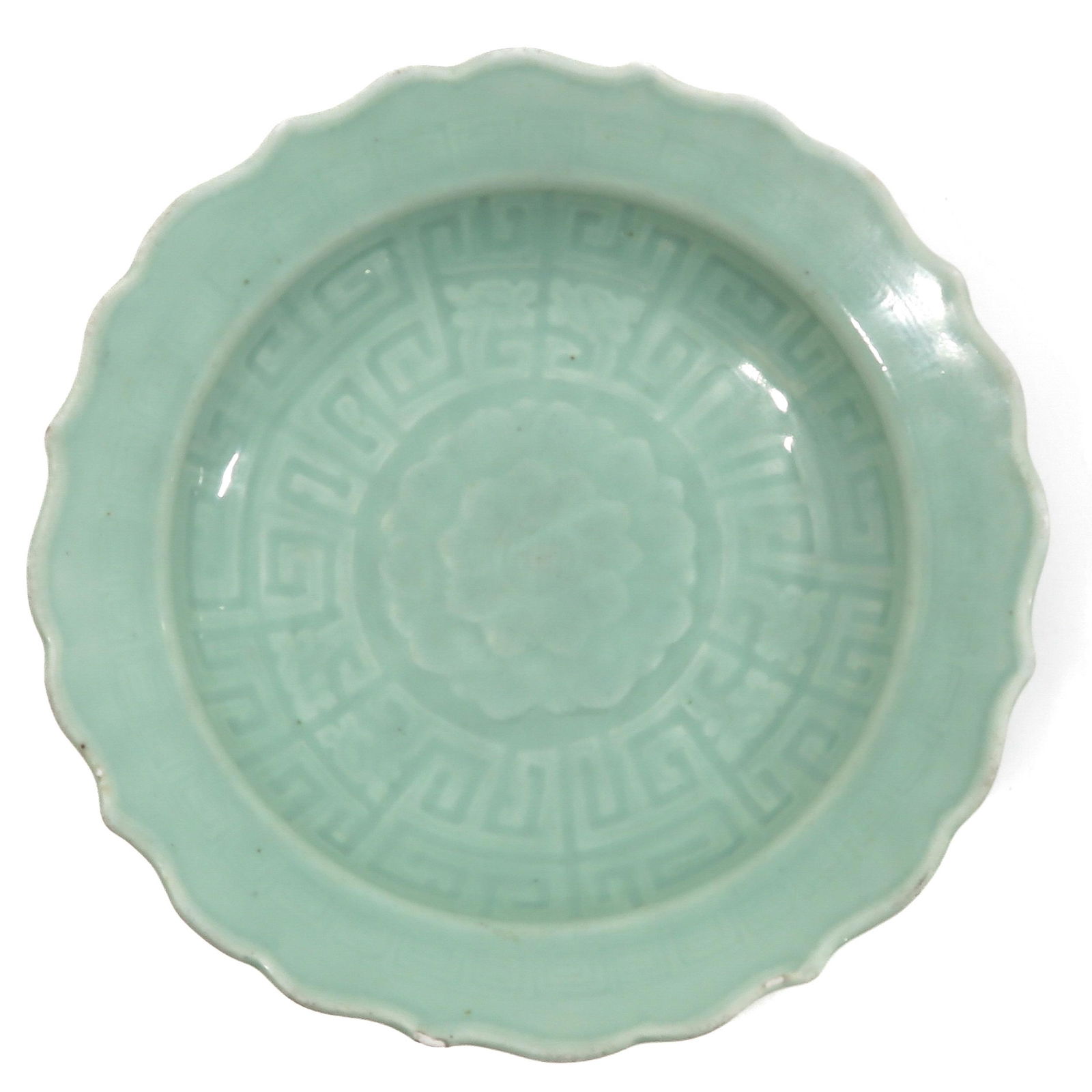 A Celadon Dish: Scalloped edge, depicting flower in center of dish, 27 cm. in diameter, chip.