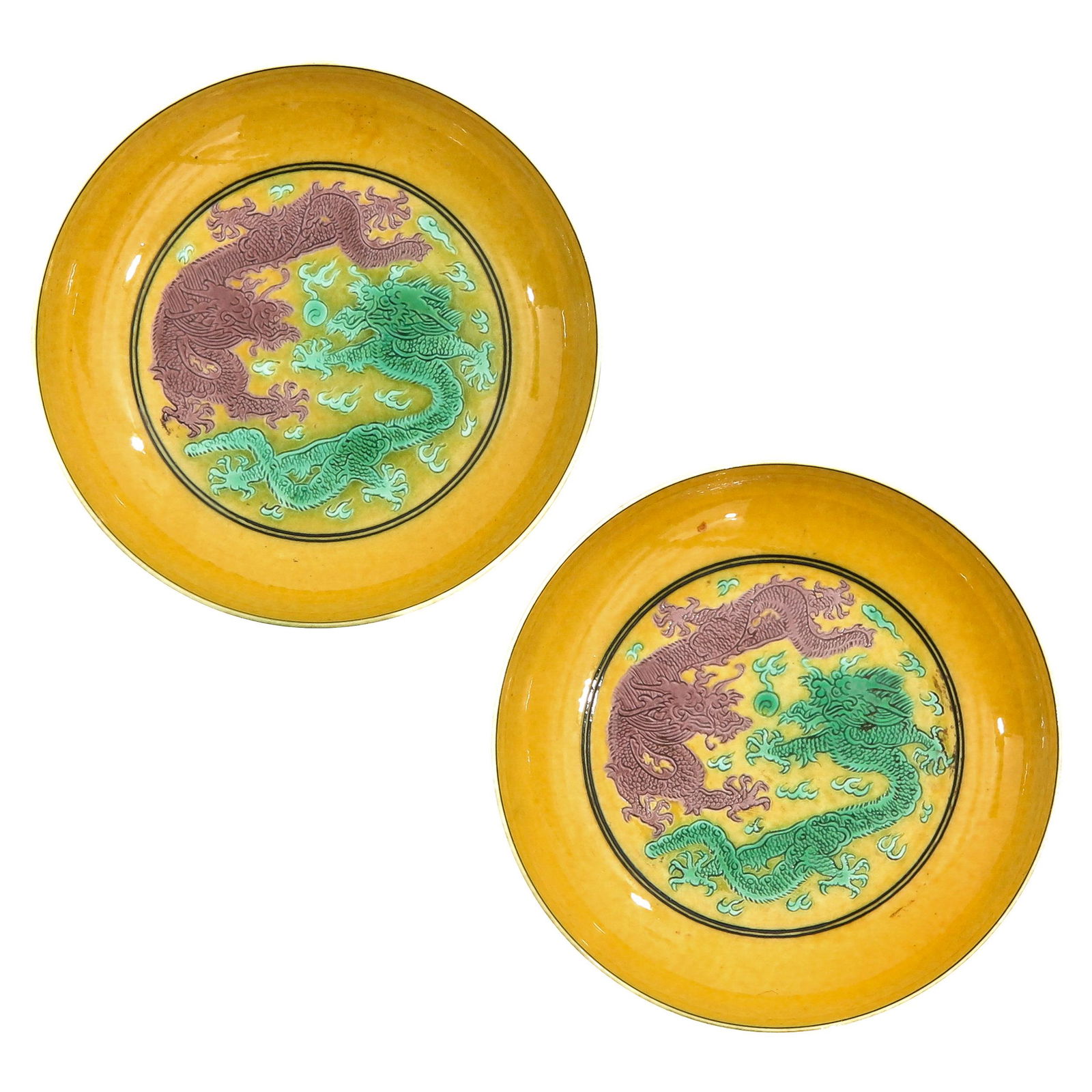 A Pair of Yellow Green and Aubergine Glazed Plates (1 of 9)