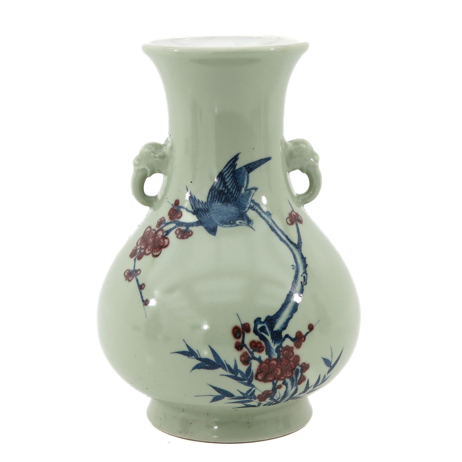 A Celadon Vase: Celadon ground decorated with bird and flower blossoms in iron red and blue, Qianlong mark, 32 cm. tall.