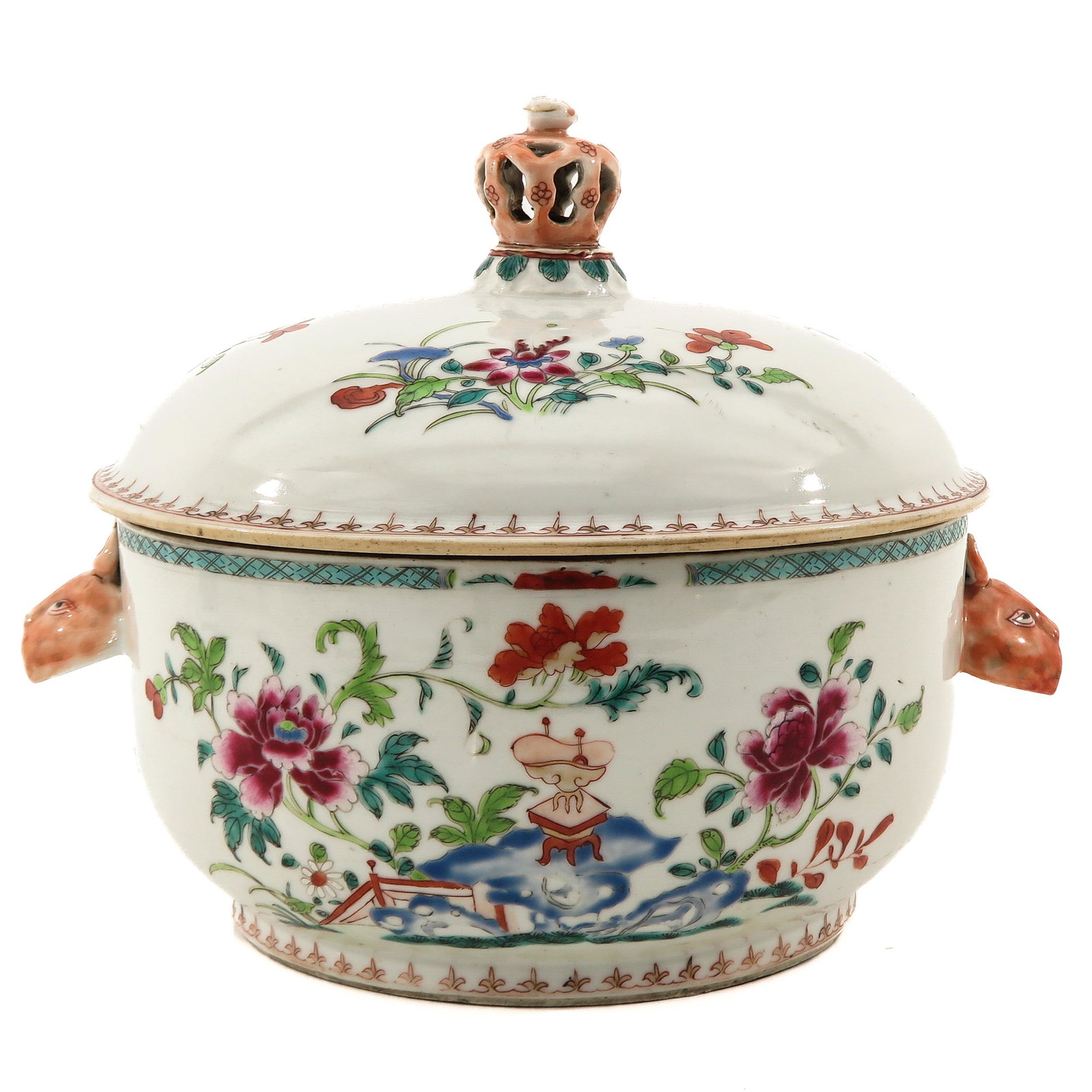 A Round Famille Rose Tureen: Decorated with flowers and Chinese Antiquities in garden, figural animal head handles, circa 1800.