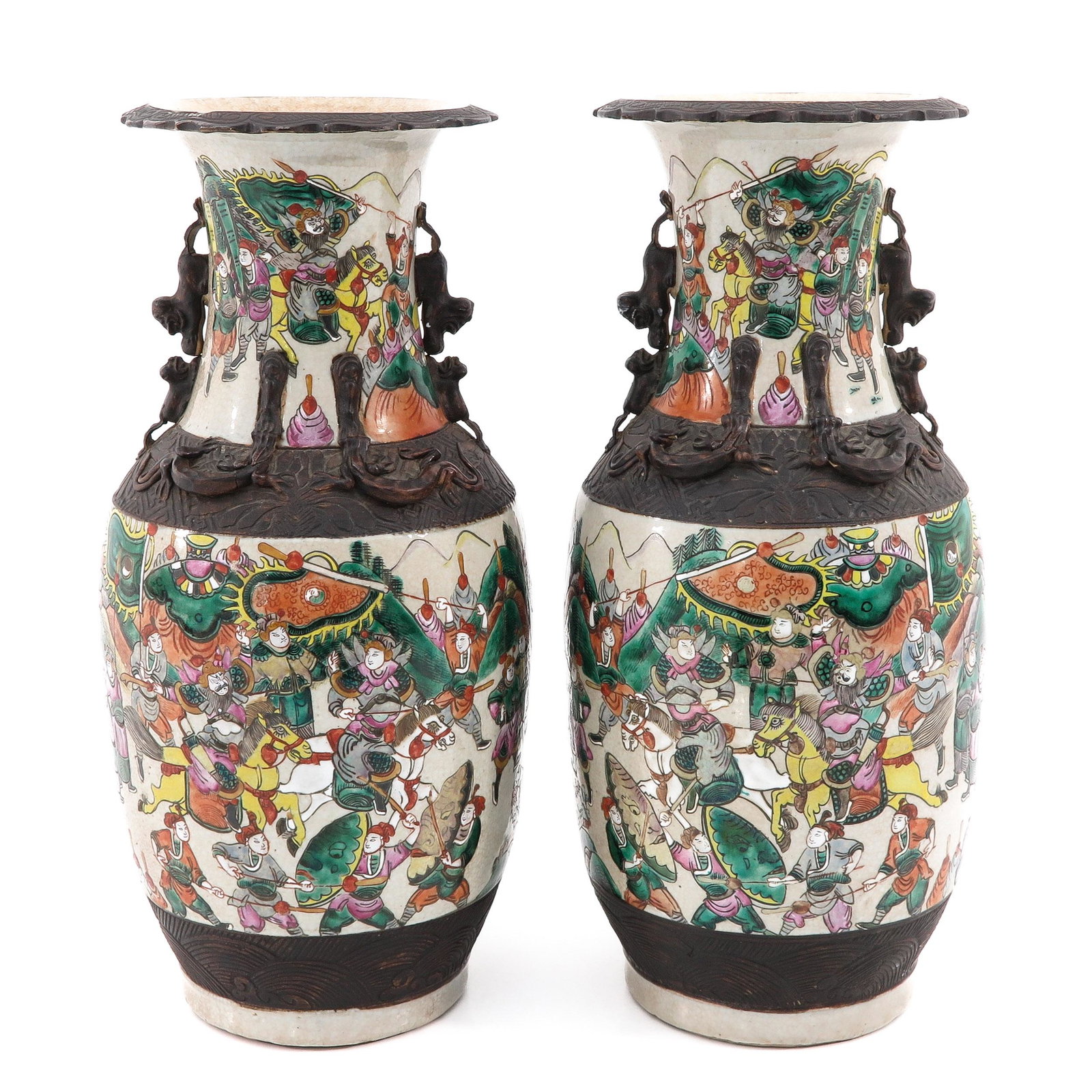 A Pair of Nanking Vases: Decorated with Chinese warriors, 47 cm. tall.