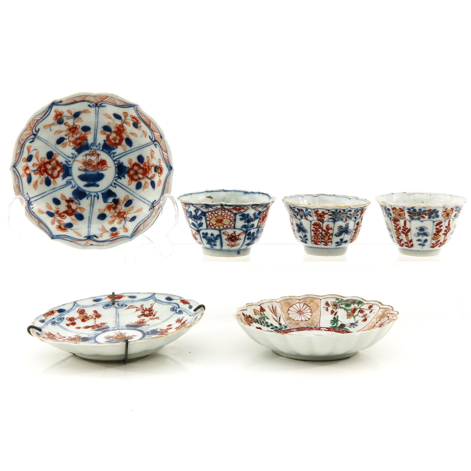 A Collection of 3 Cups and Saucers: Floral decor, 18th Century, saucers are 11 cm. in diameter, chip.