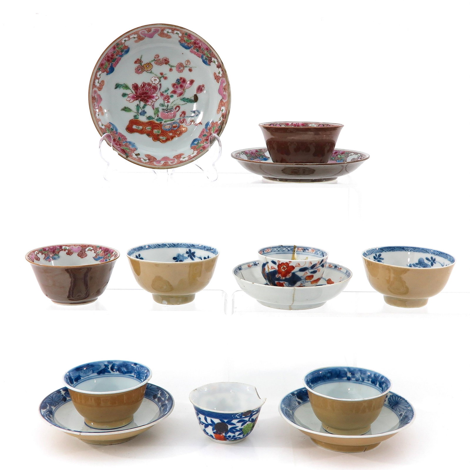 A Collection of Cups and Saucers: 13 pieces, in a variety of decors and sizes, including 18th century, largest saucer is 14 cm. in diameter, in diverse conditions.