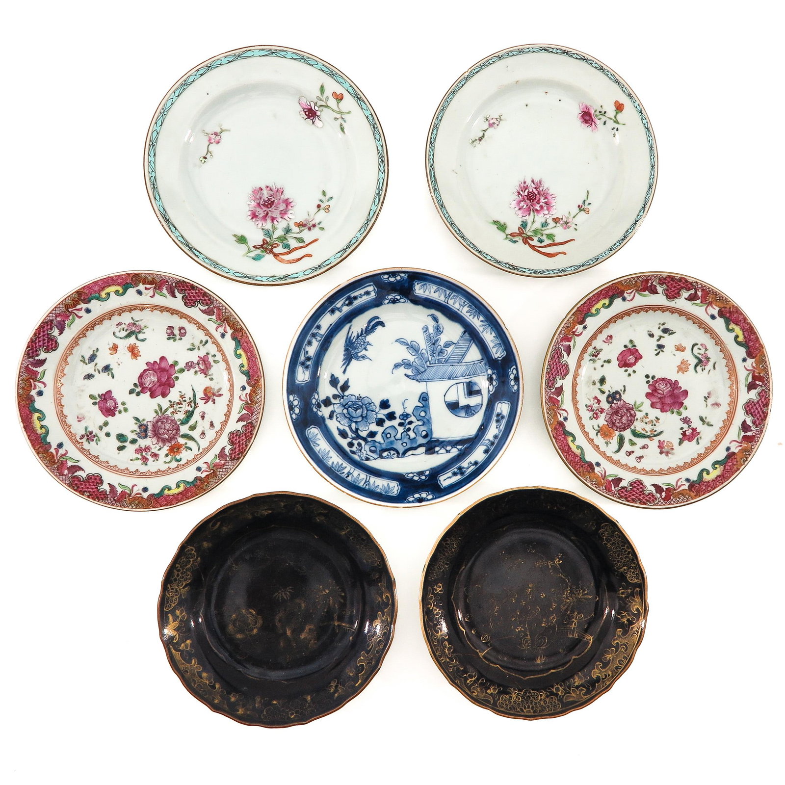 A Collection of 7 Plates: In a variety of decors and sizes, including 18th Century, largest plate is 16 cm. in diameter, in diverse conditions.