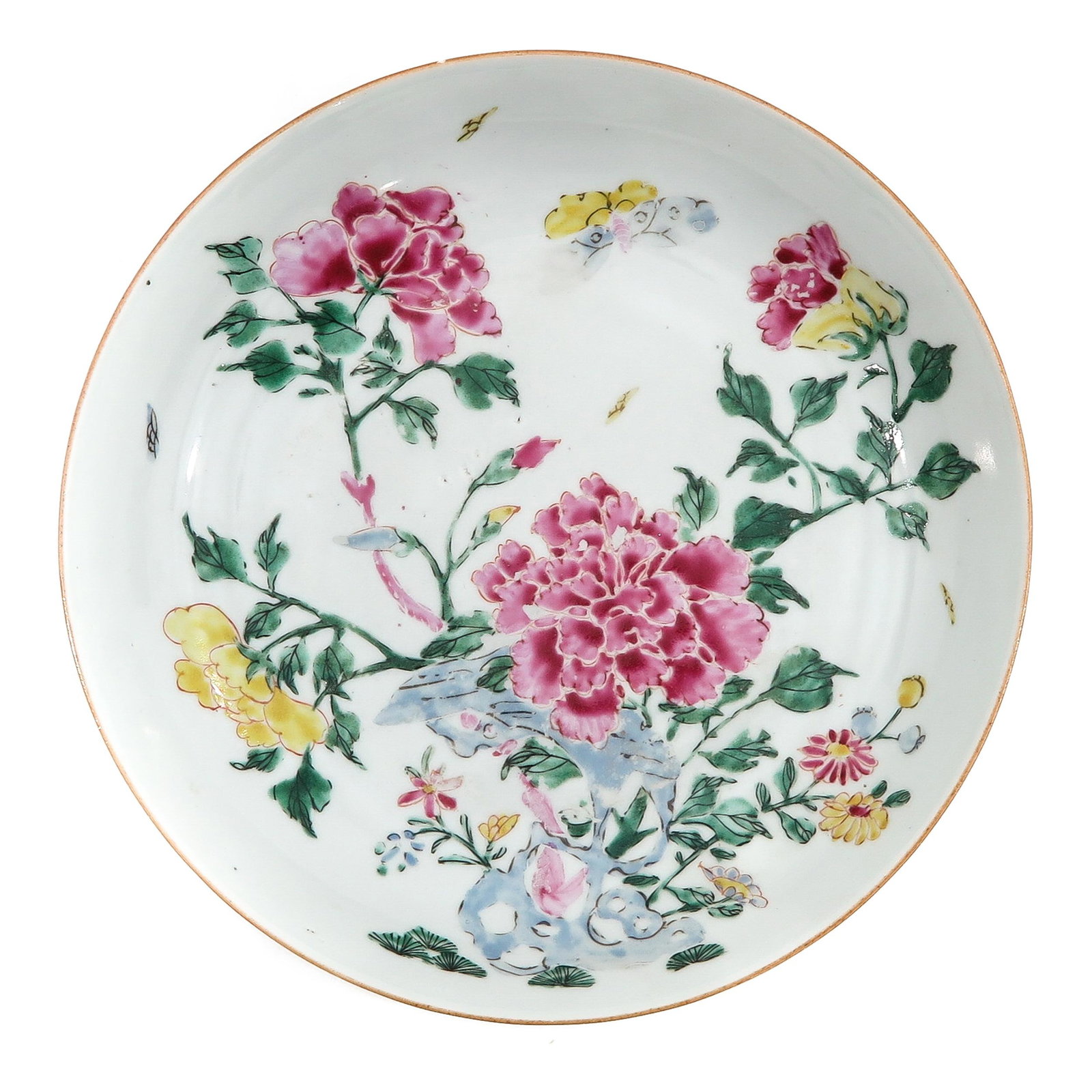 A Famille Rose Plate: Decorated with peonies, 23 cm. in diameter.