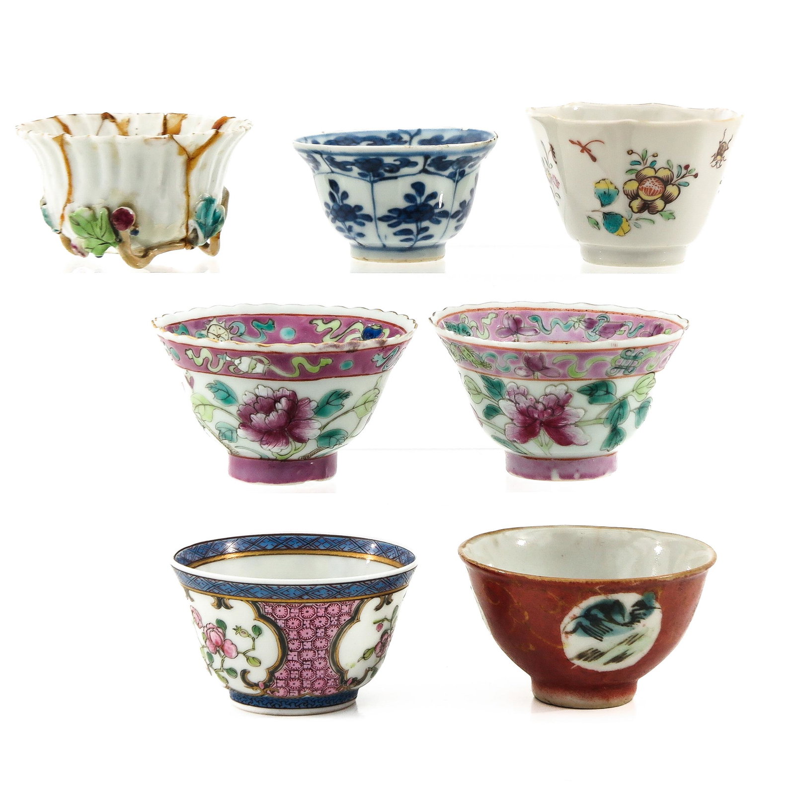 A Collection of 7 Cups: In a variety of decors and sizes, including 18th Century, largest cup is 8 cm. in diameter, in diverse conditions.