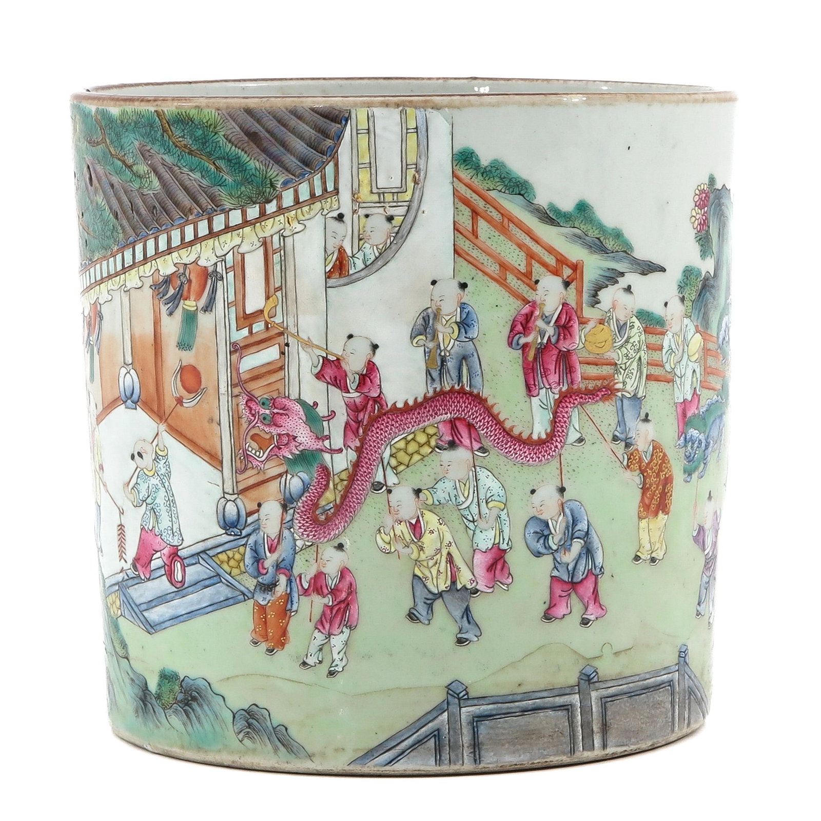 A Famille Rose Brush Pot: Decorated with Chinese figures playing games and parading through garden, 17 cm. tall x 17 cm. in diameter.