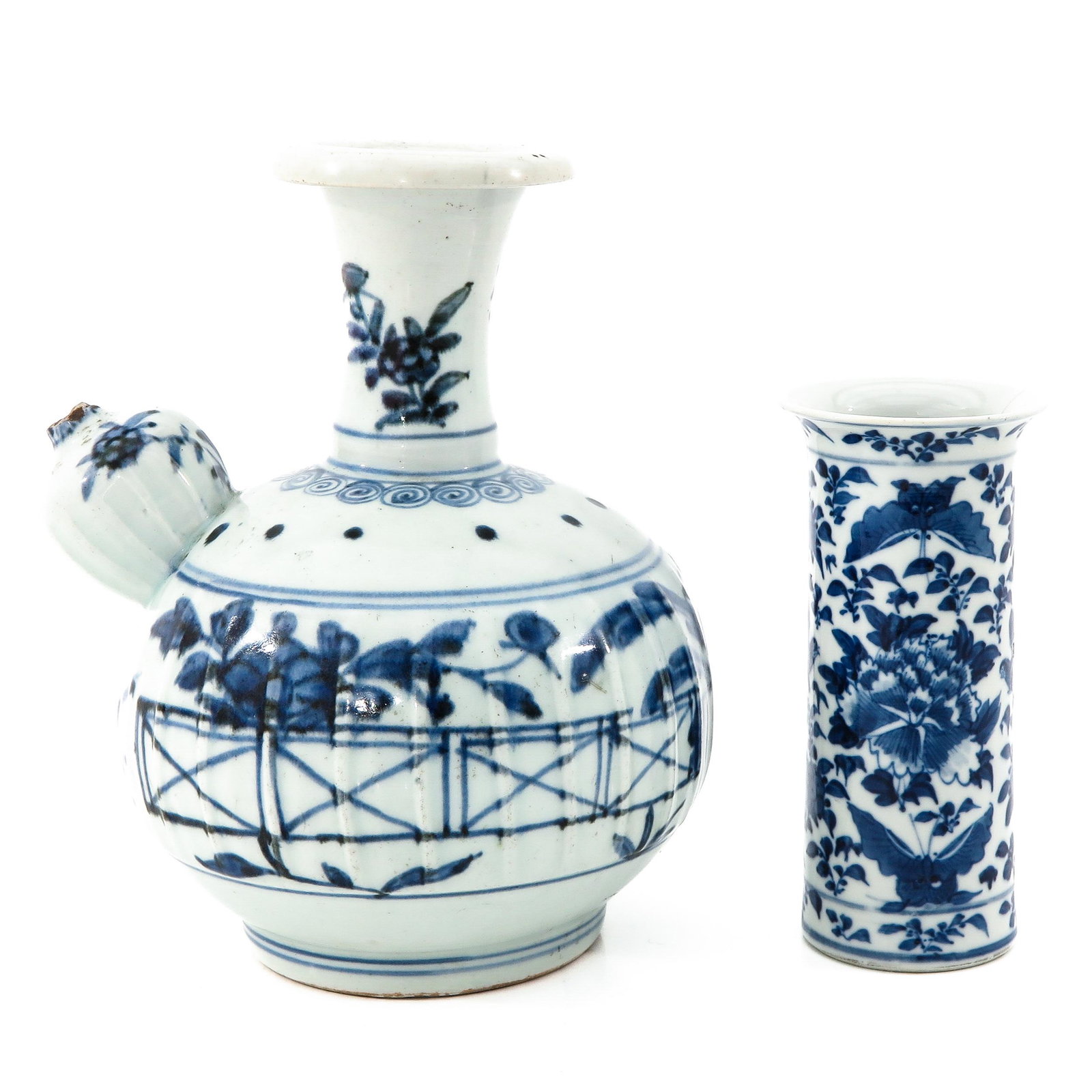 A Blue and White Kendi and Garniture Vase: Kendi is 22 cm. tall, vase measures 15 cm. tall, chip and hairline.