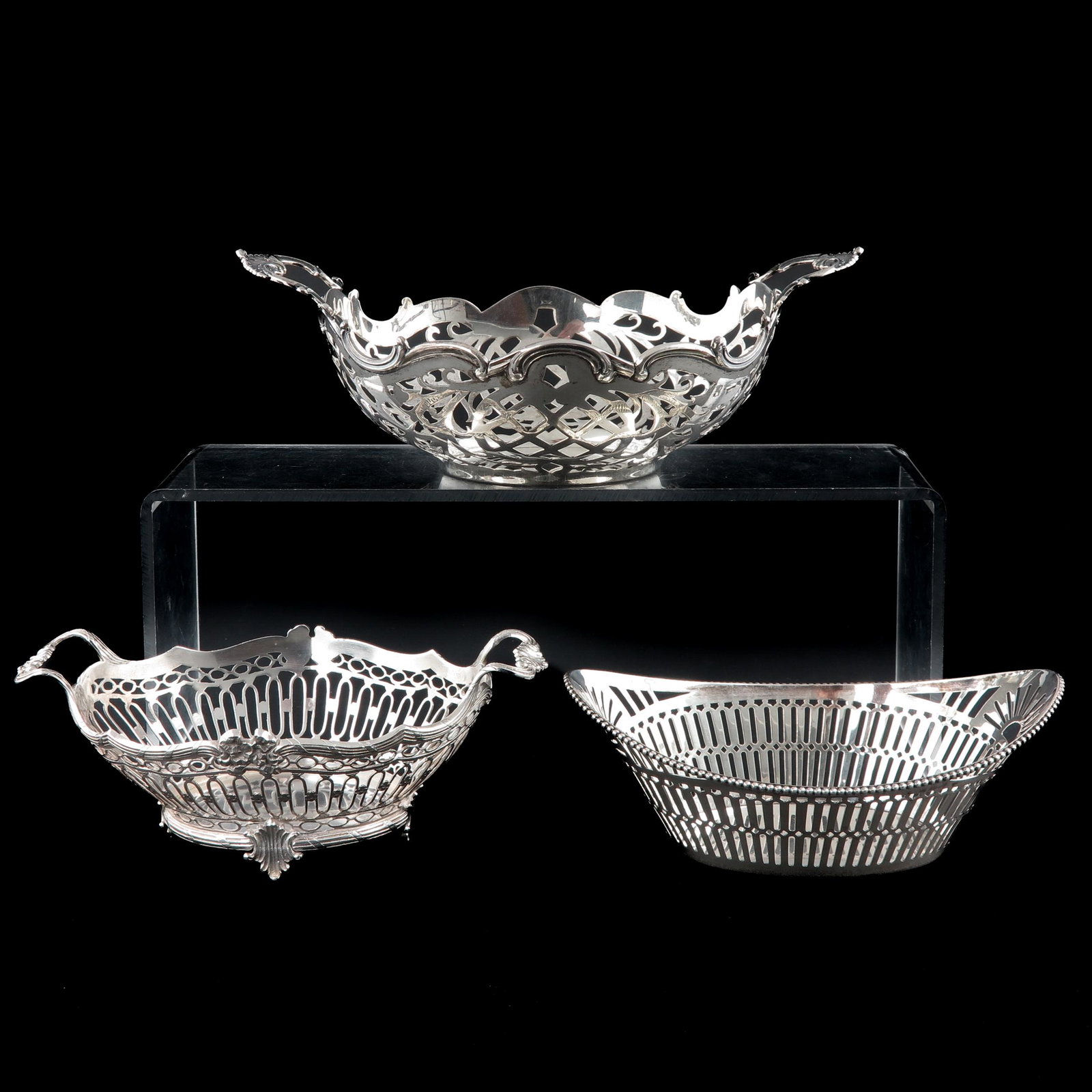 A Collection of 3 Silver Baskets: Longest is 20 cm.