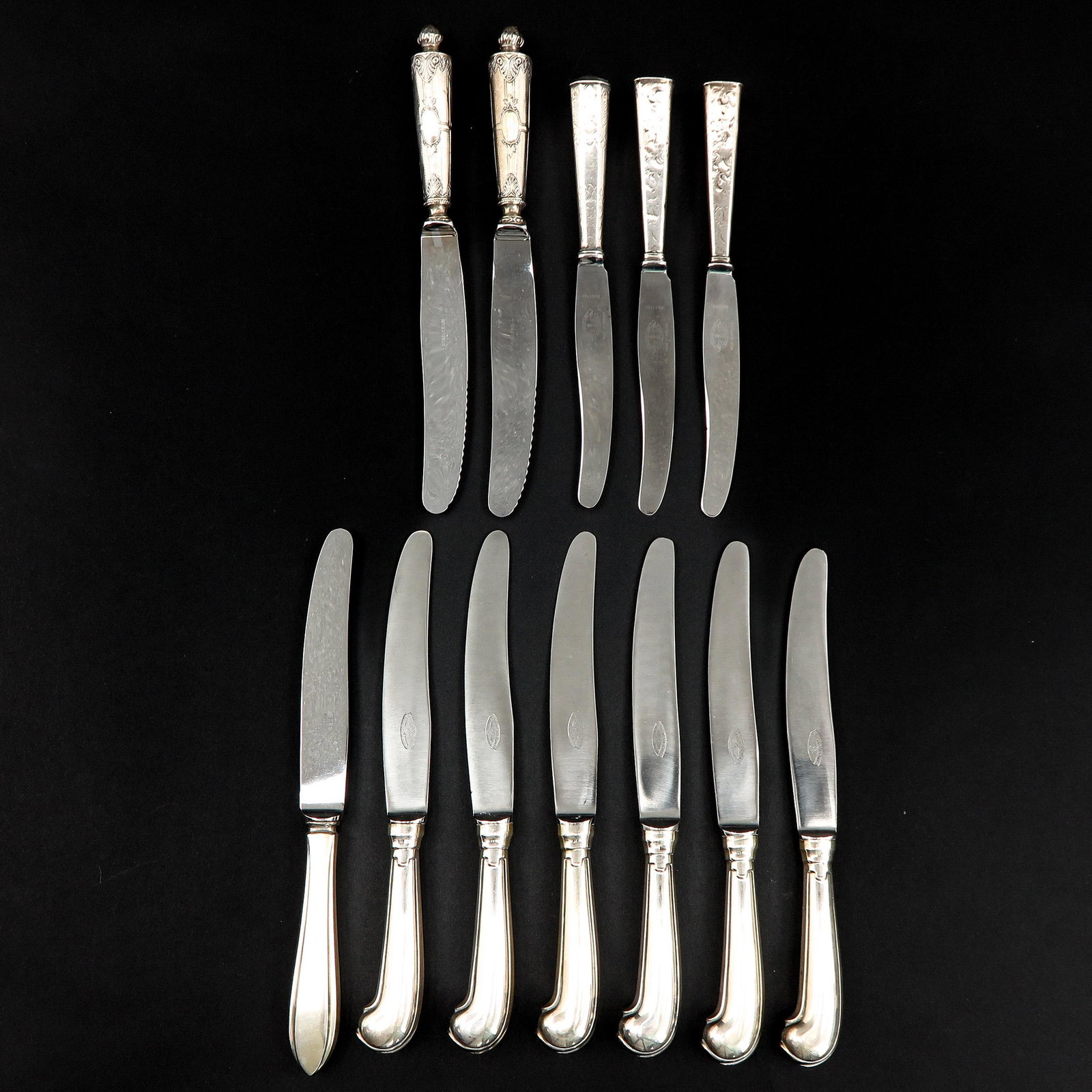 A Collection of Diverse Knives: Including silver pistol handle, longest is 23 cm.