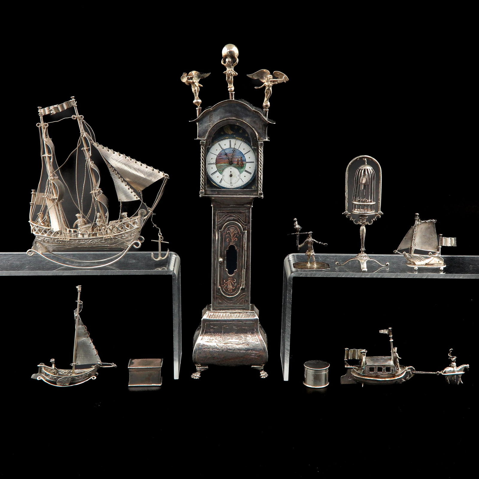 A Collection of 9 Silver Miniatures (1 of 10)