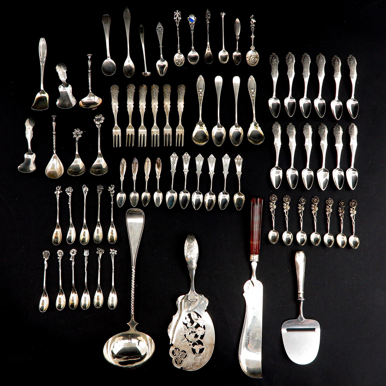 A Collection of Diverse Items: Including serving pieces, set with Carnelian.