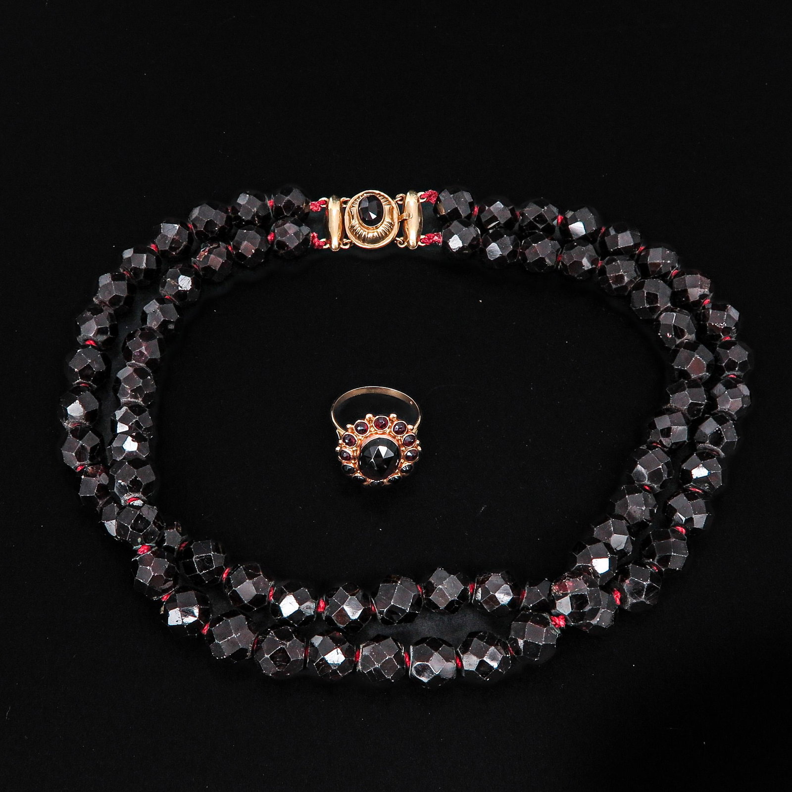 A 2 Strand Garnet Necklace and Garnet Ring: 14KG ring is size 18.