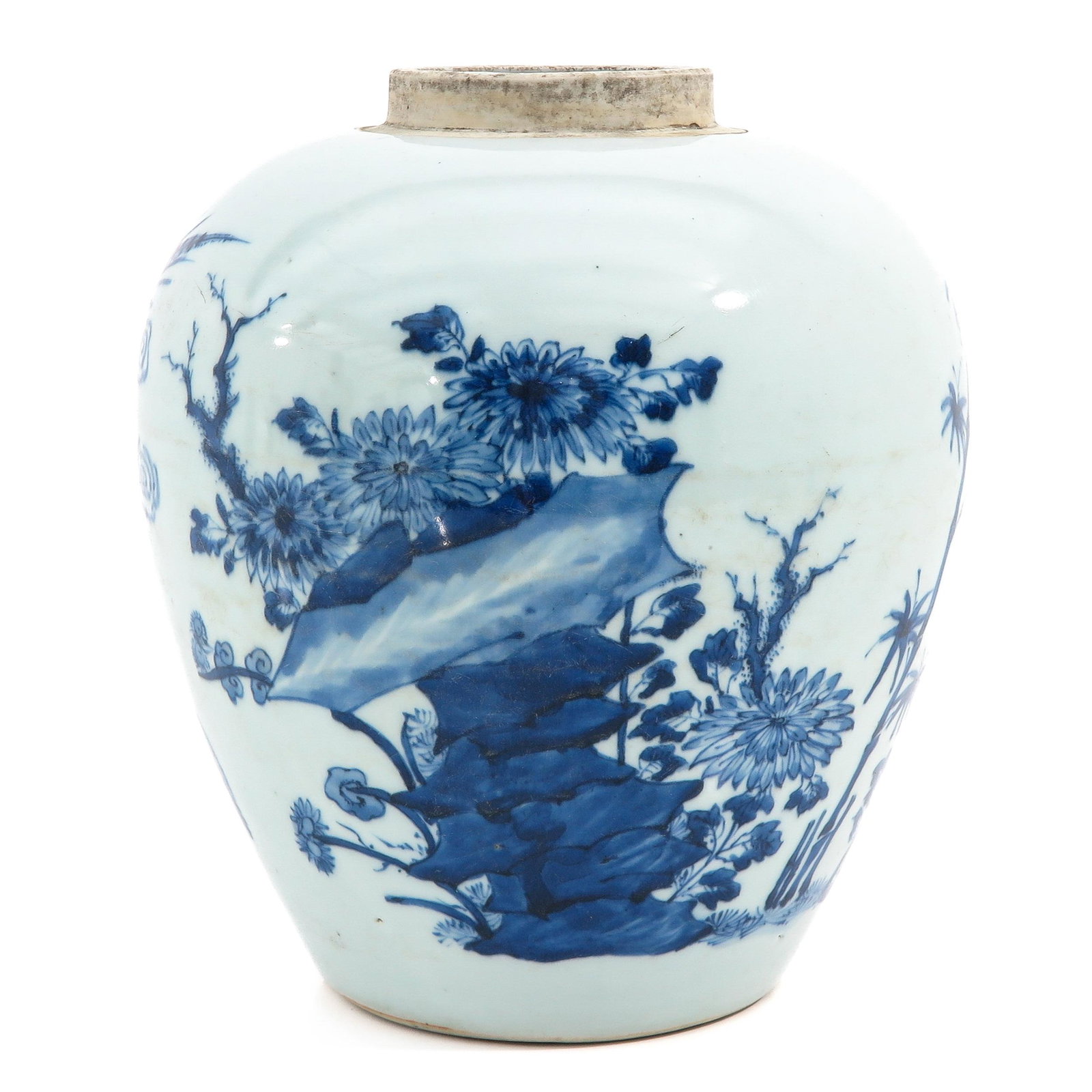 A Blue and White Ginger Jar: Depicting scene in garden with bamboo tree, flowers, and birds, 25 cm. tall.