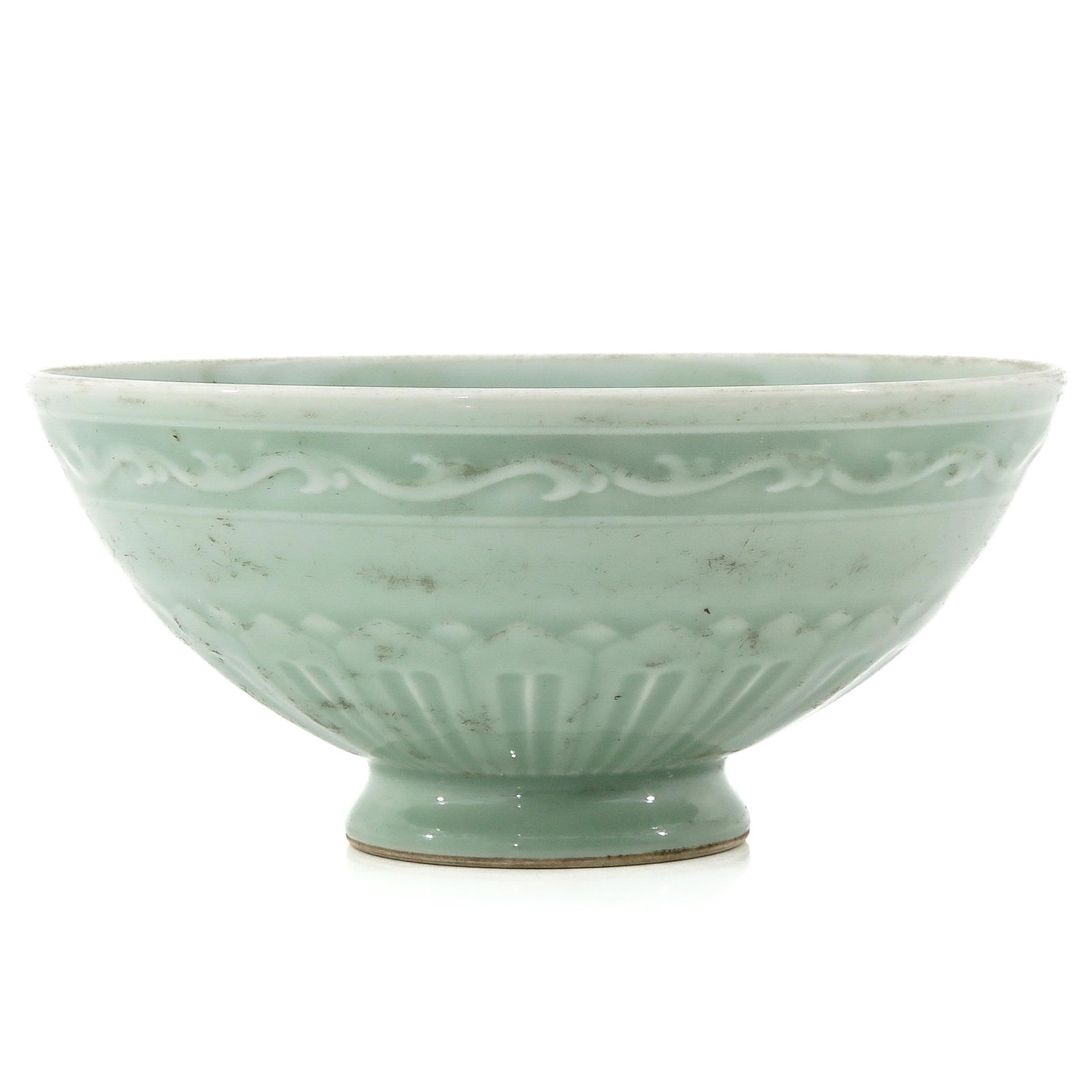 A Celadon Bowl: On raised circular base, Yongzheng mark, 20 cm. in diameter.