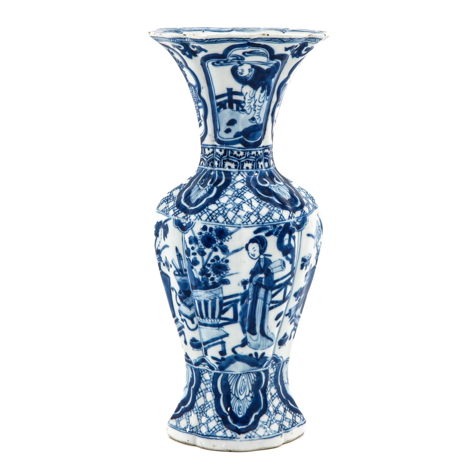 A Blue and White Garniture Vase: Depicting Chinese figures in garden, Kangxi Period, 28 cm. tall, chip.