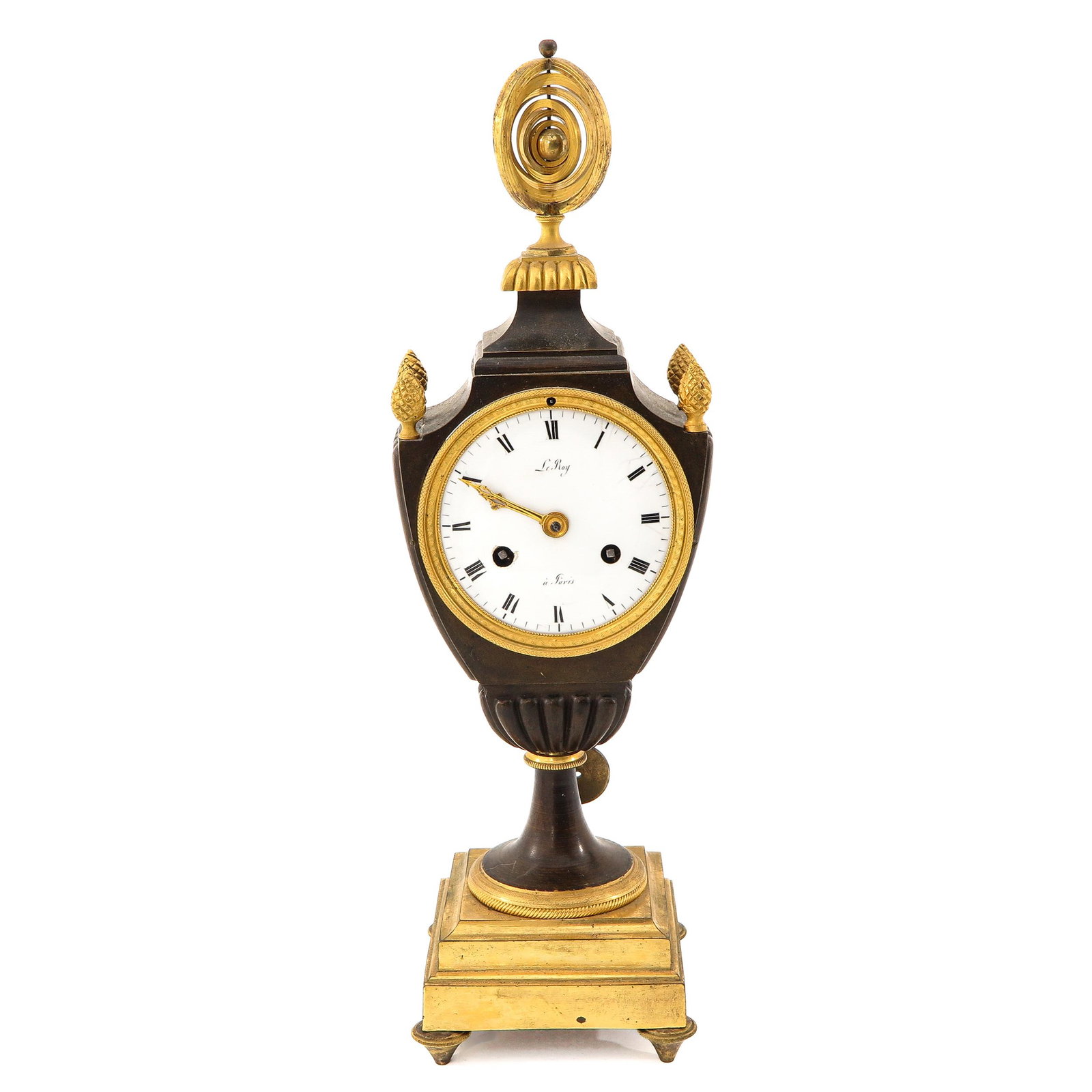 An Empire Period Pendule: Empire period, ormolu plate, signed Le Roy Paris, height 41 cm.