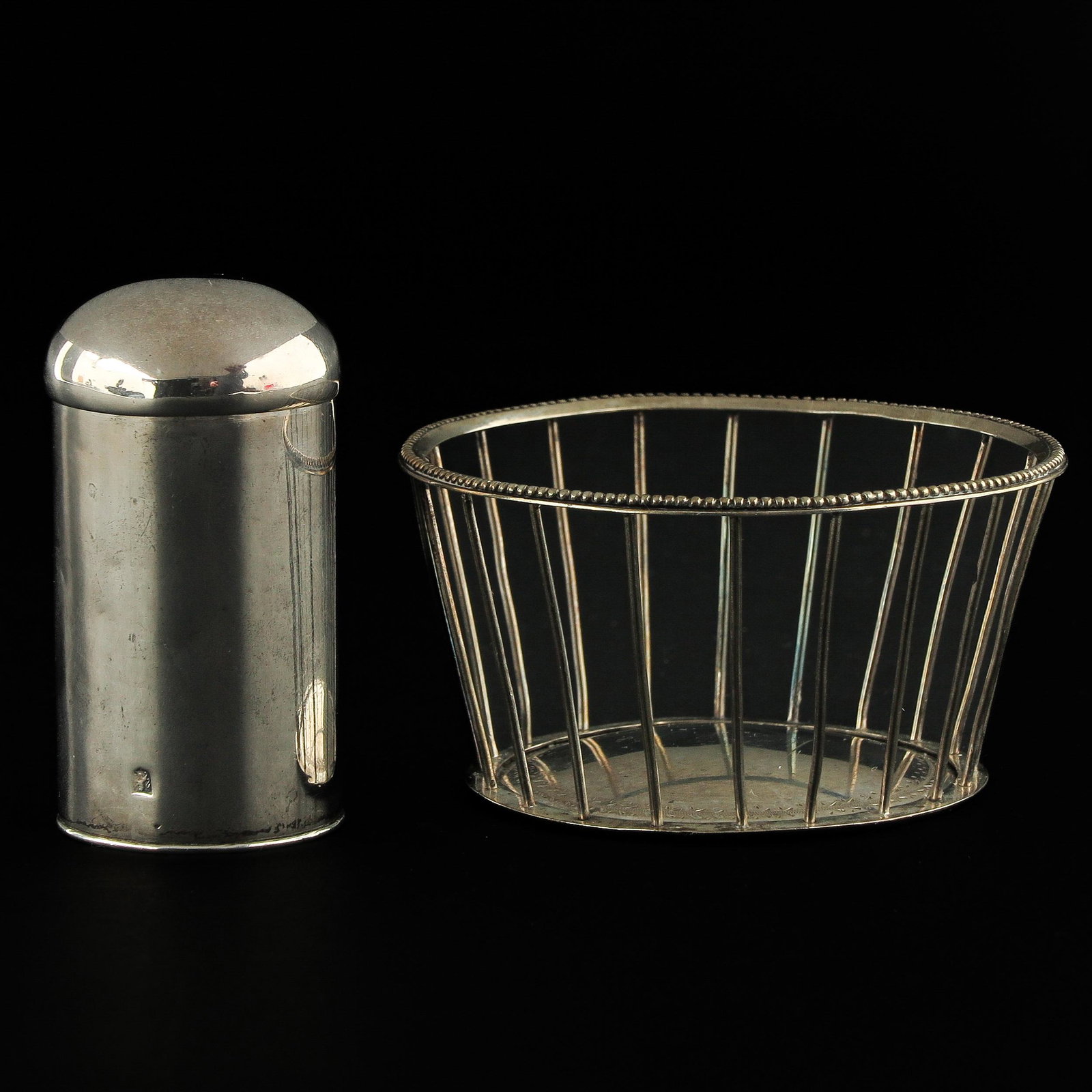 A Silver Ball Basket and Cinnamon Castor: Dutch silver, 1837, 7 cm. tall.