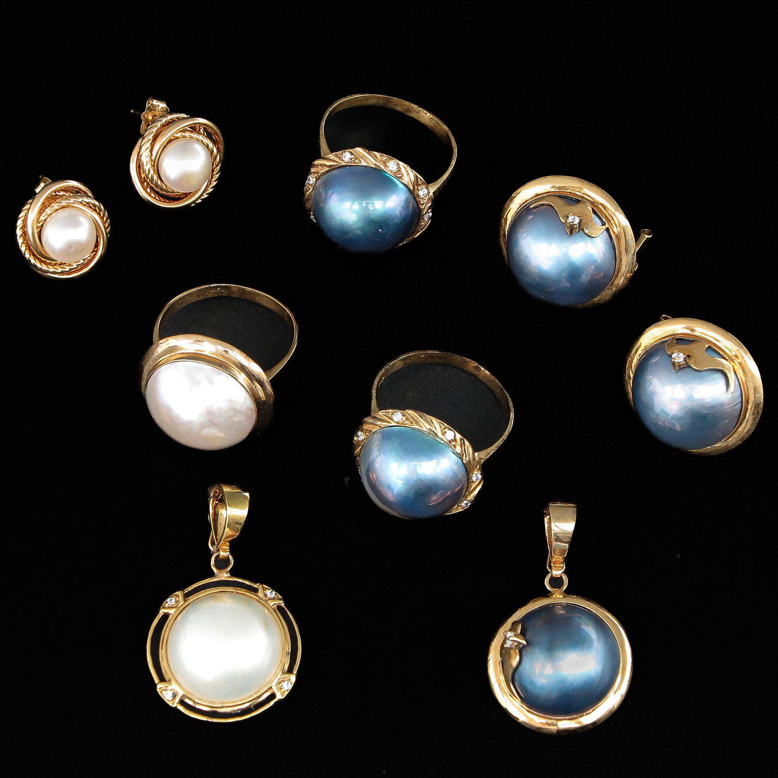 A Collection of Jewelry: Including 14KG, consisting of 3 rings, 2 pendants and 2 pairs of ear studs, Mabe pearls, largest diameter 19 mm.