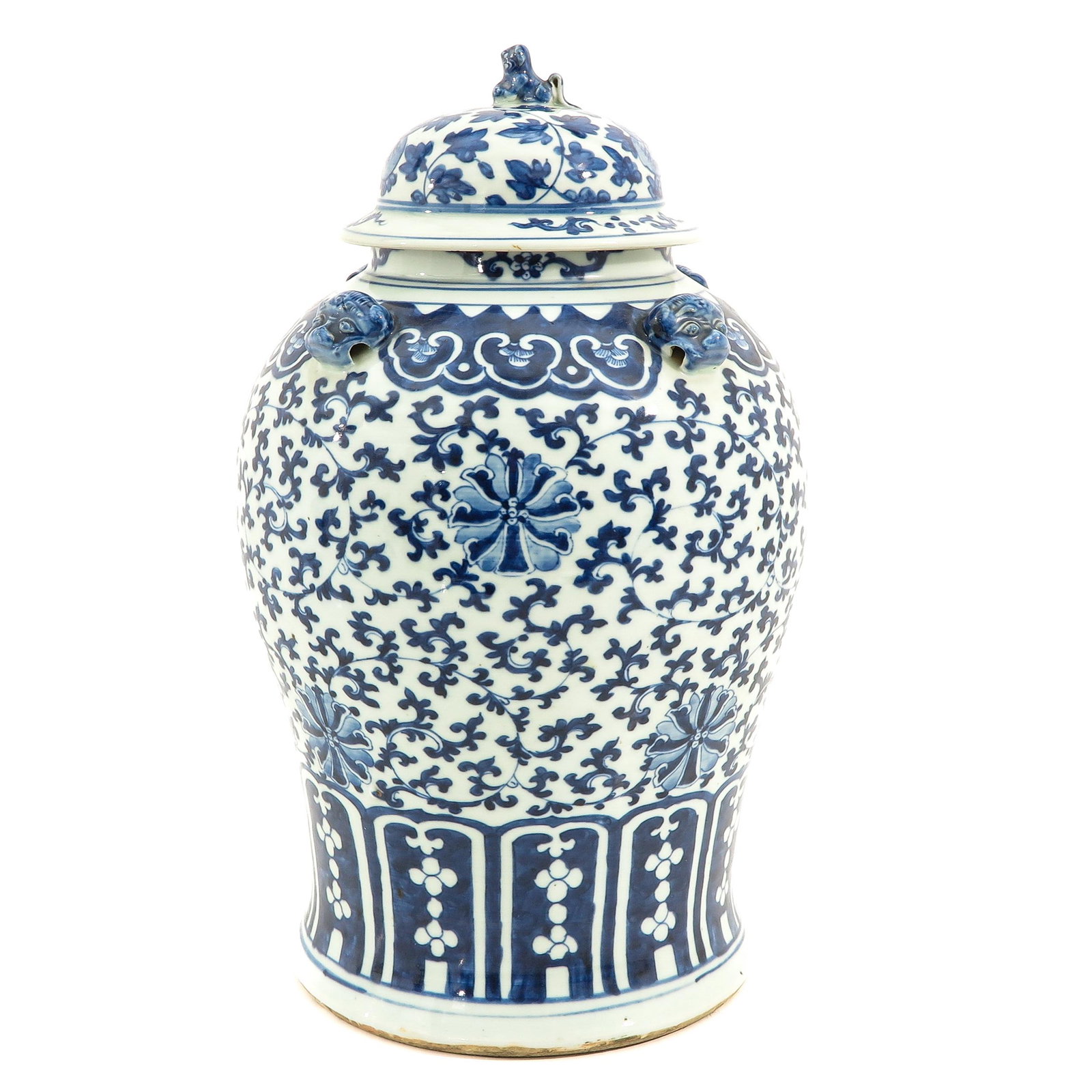 A Blue and White Jar with Cover: Decorated with flowers, temple lion handles, Daoguang Period, 46 cm. tall.