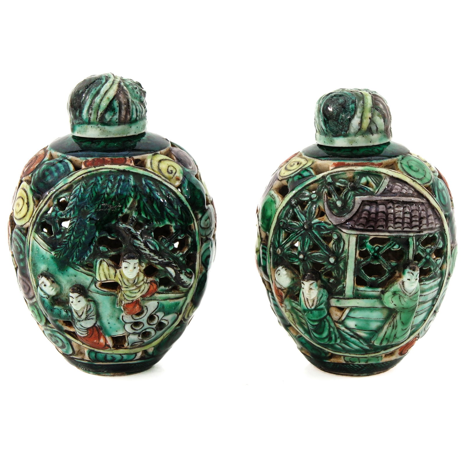 A Pair of Snuff Bottles: Green glaze decorated wtih Chinese figures, 8 cm. tall.