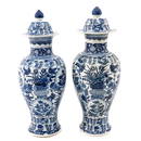 A Pair of Blue and White Vases with Covers