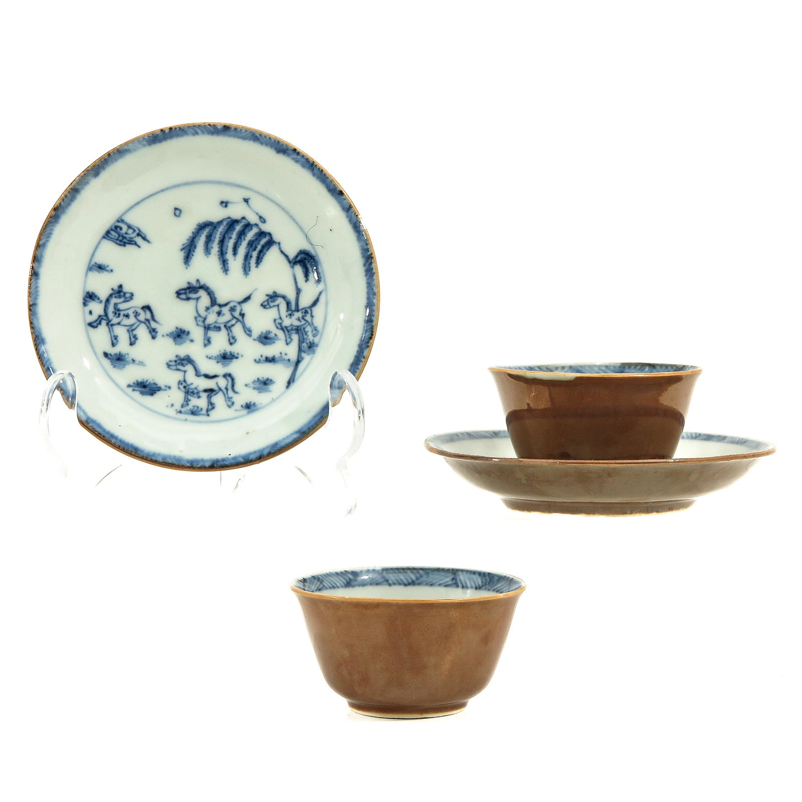 A Pair of Batavianware Cups and Saucers: Rare scene with horses, 18th Century, saucers are 11 cm. in diameter.