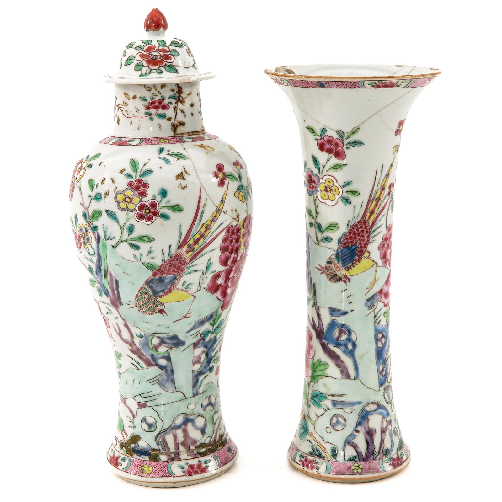 A Lot of 2 Famille Rose Garniture Vases: Floral decor, 18th Century, tallest vase is 29 cm., both restored.