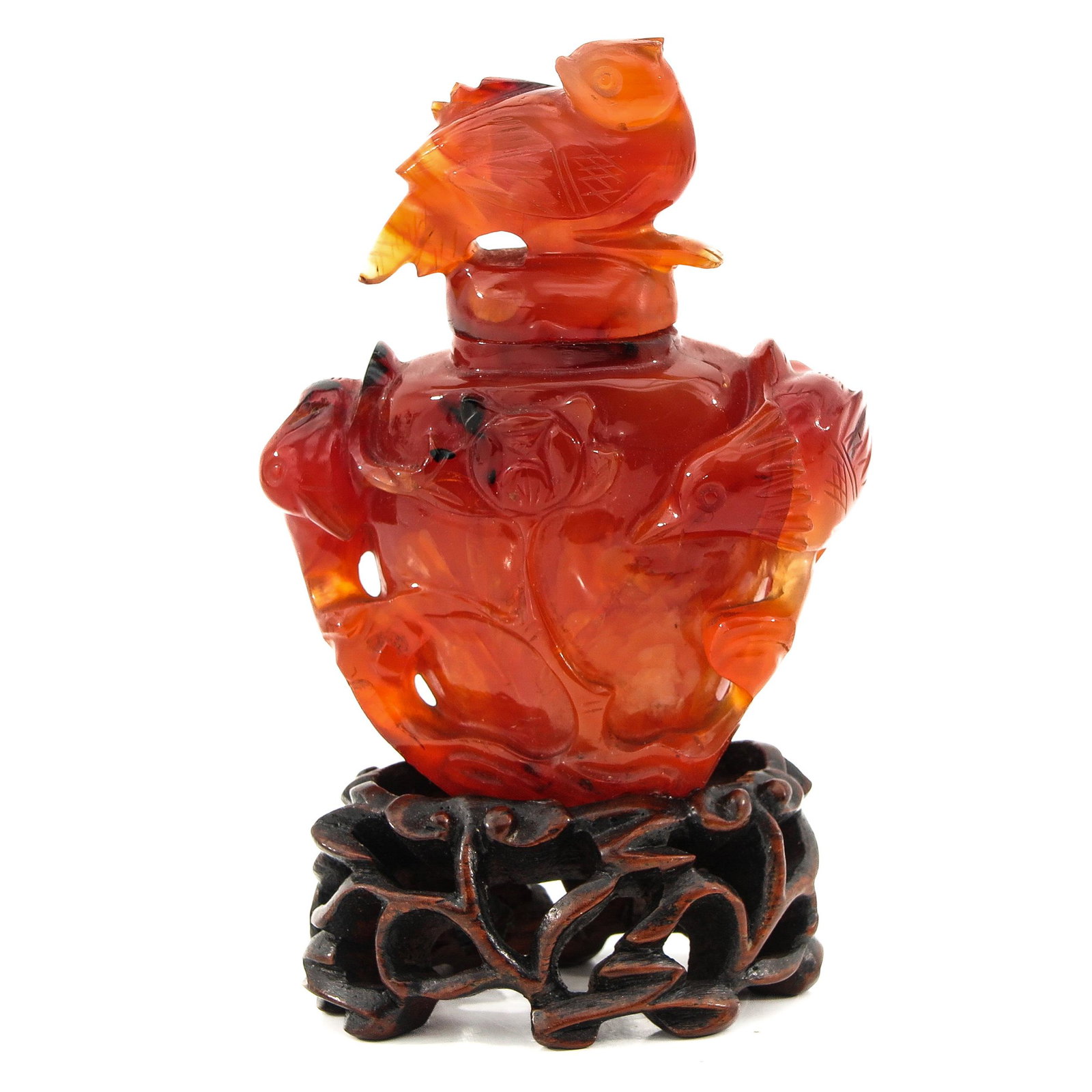 A Snuff Bottle: Mounted on carved wood base, floral and bird decor, total height is 10 cm. tall, snuff bottle is glued to base with top also glued to snuff bottle,