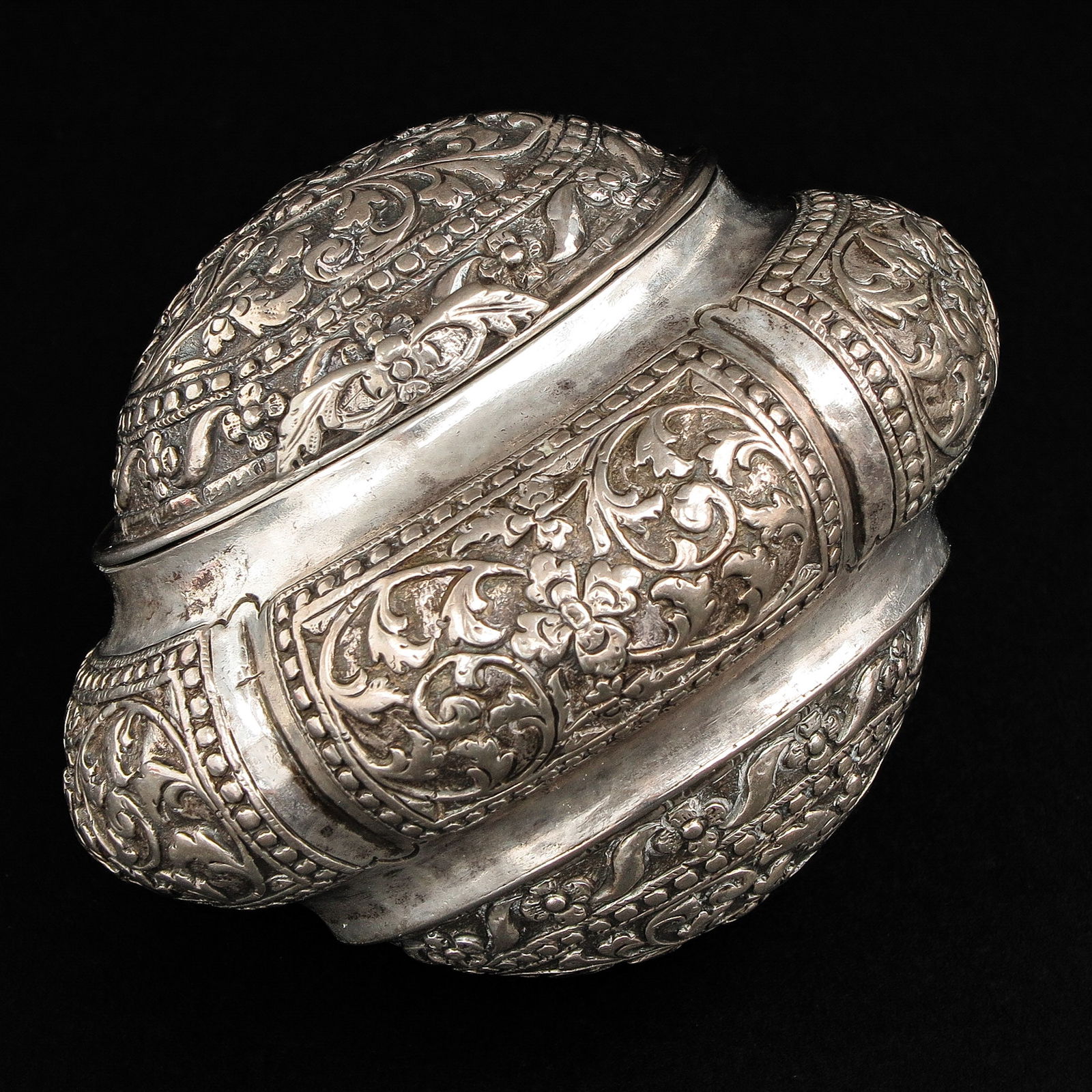 A Silver Box or Siridoos: Djokja silver, 9 cm. long.