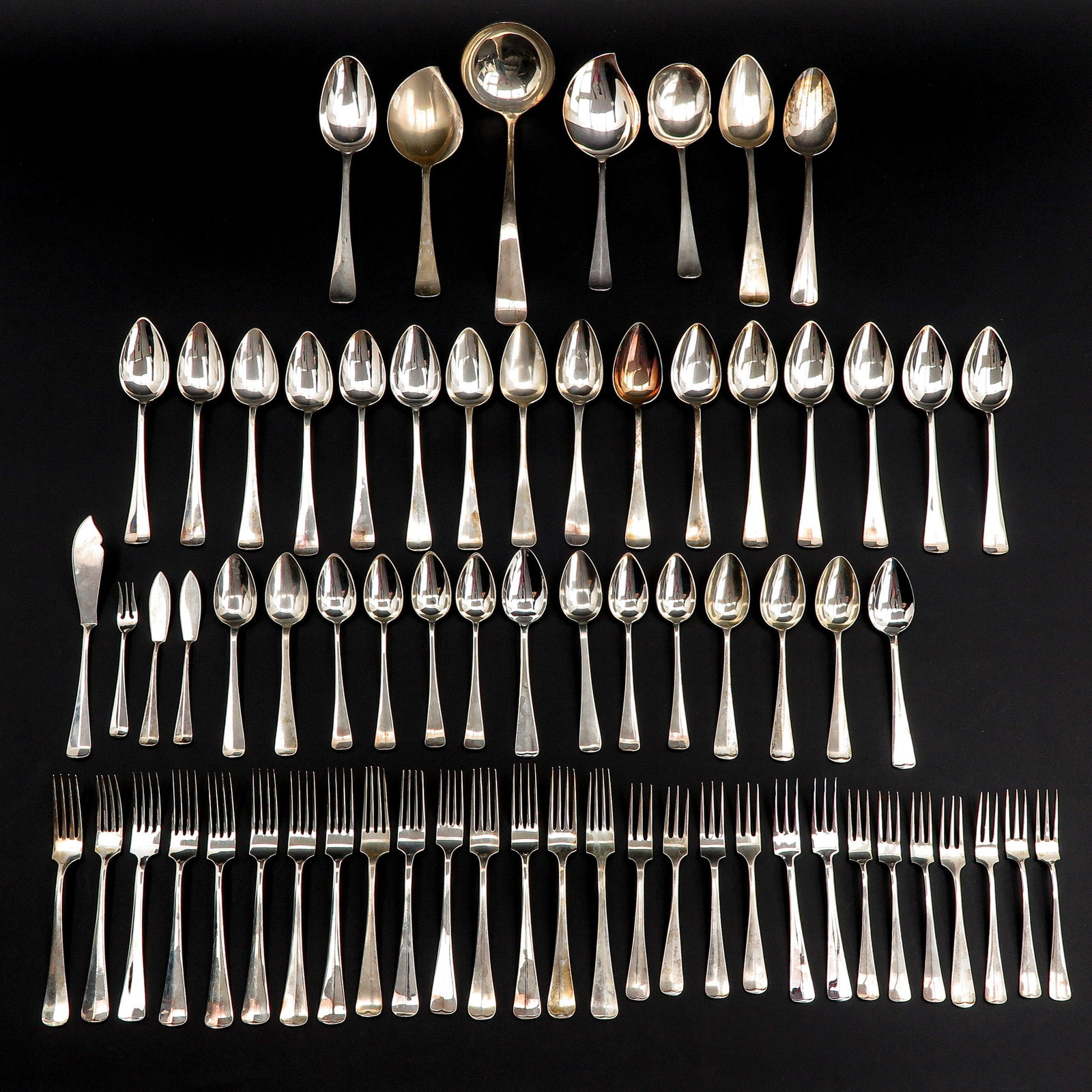 A Collection of Silver Cutlery: Hollands glad model, longest piece is 27 cm.