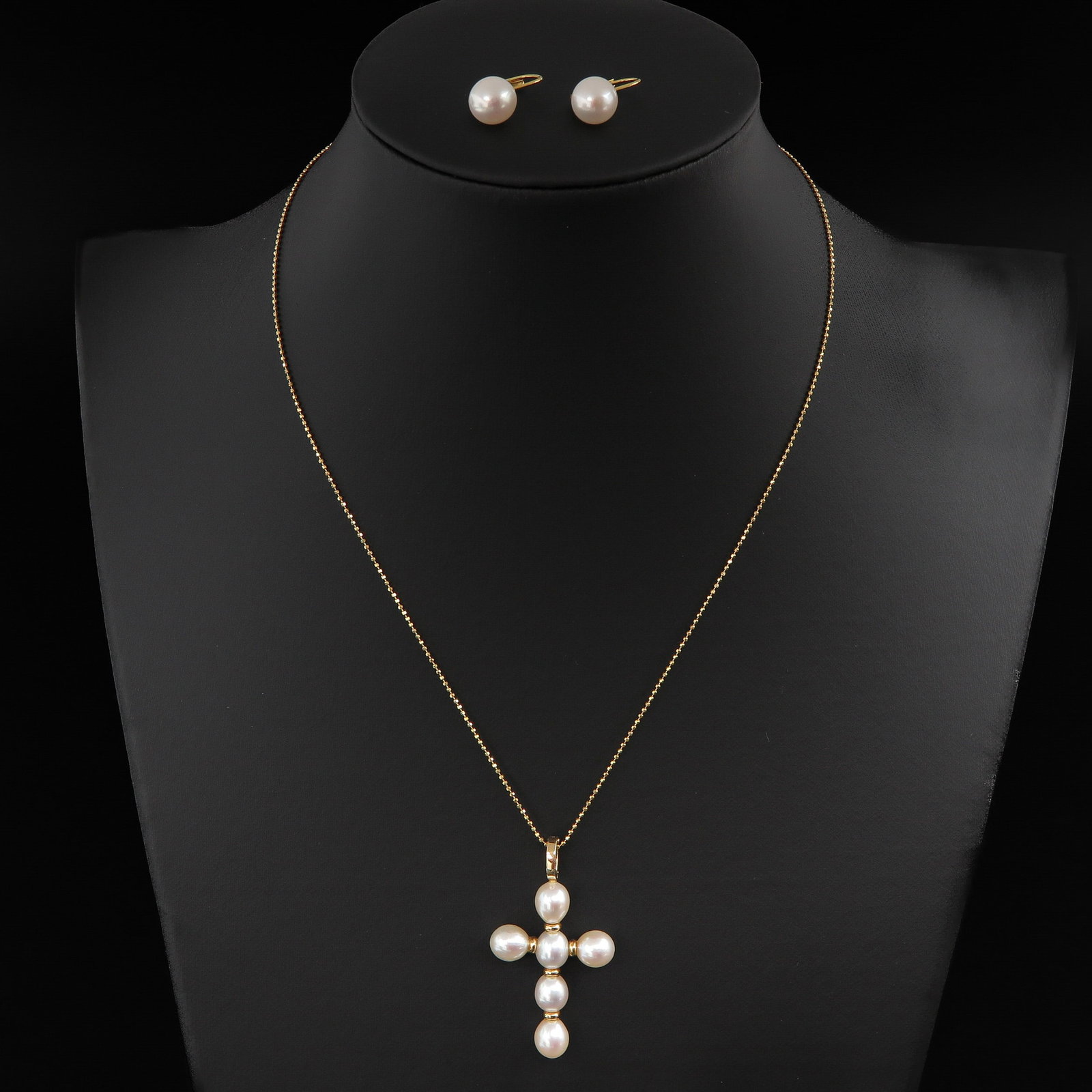 A Pearl Necklace and Earrings: Hanger is 43 mm. long.