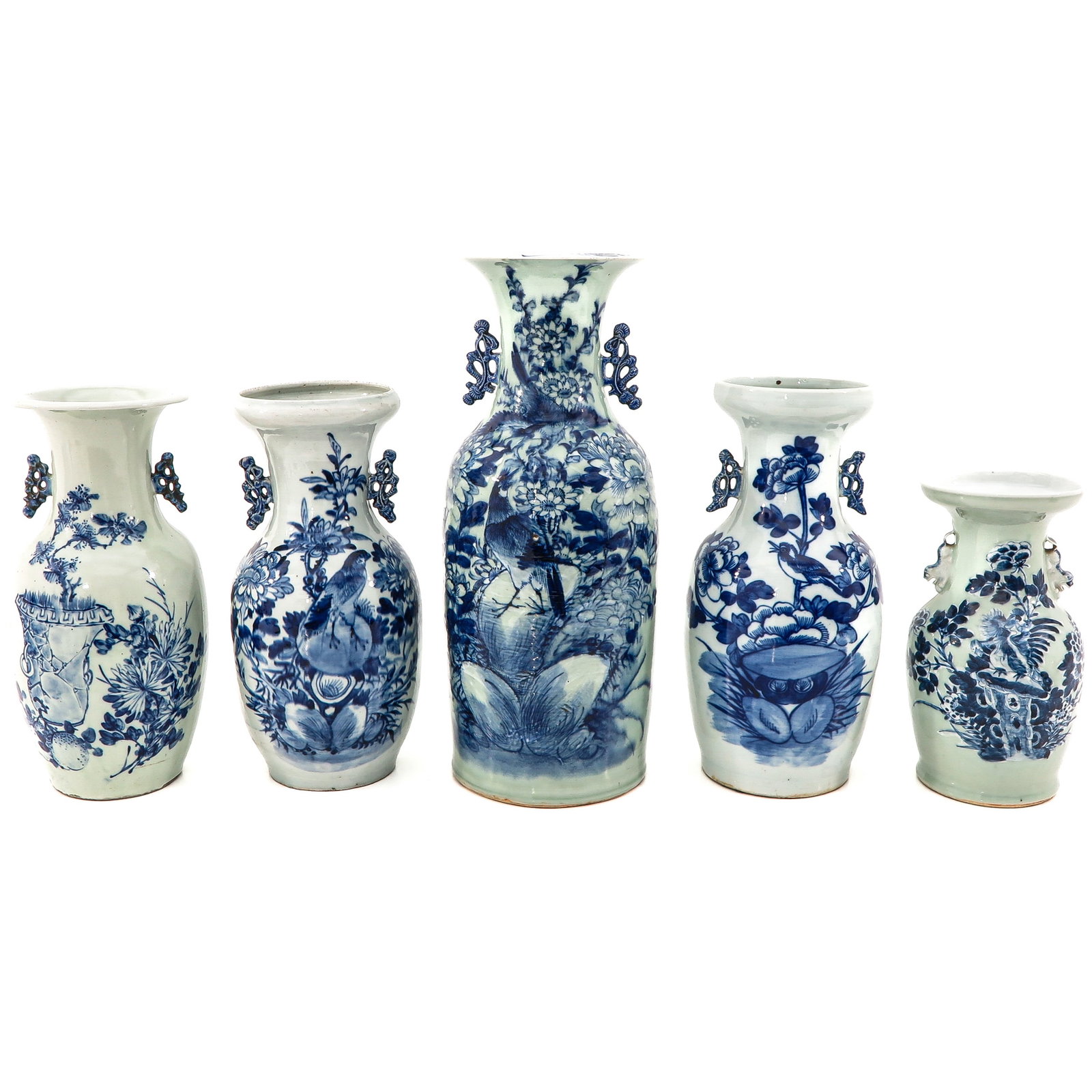 A Collection of 5 Blue and White Vases: In a variety of bird and flower decors, largest vase is 57 cm. tall, chip and hairline.