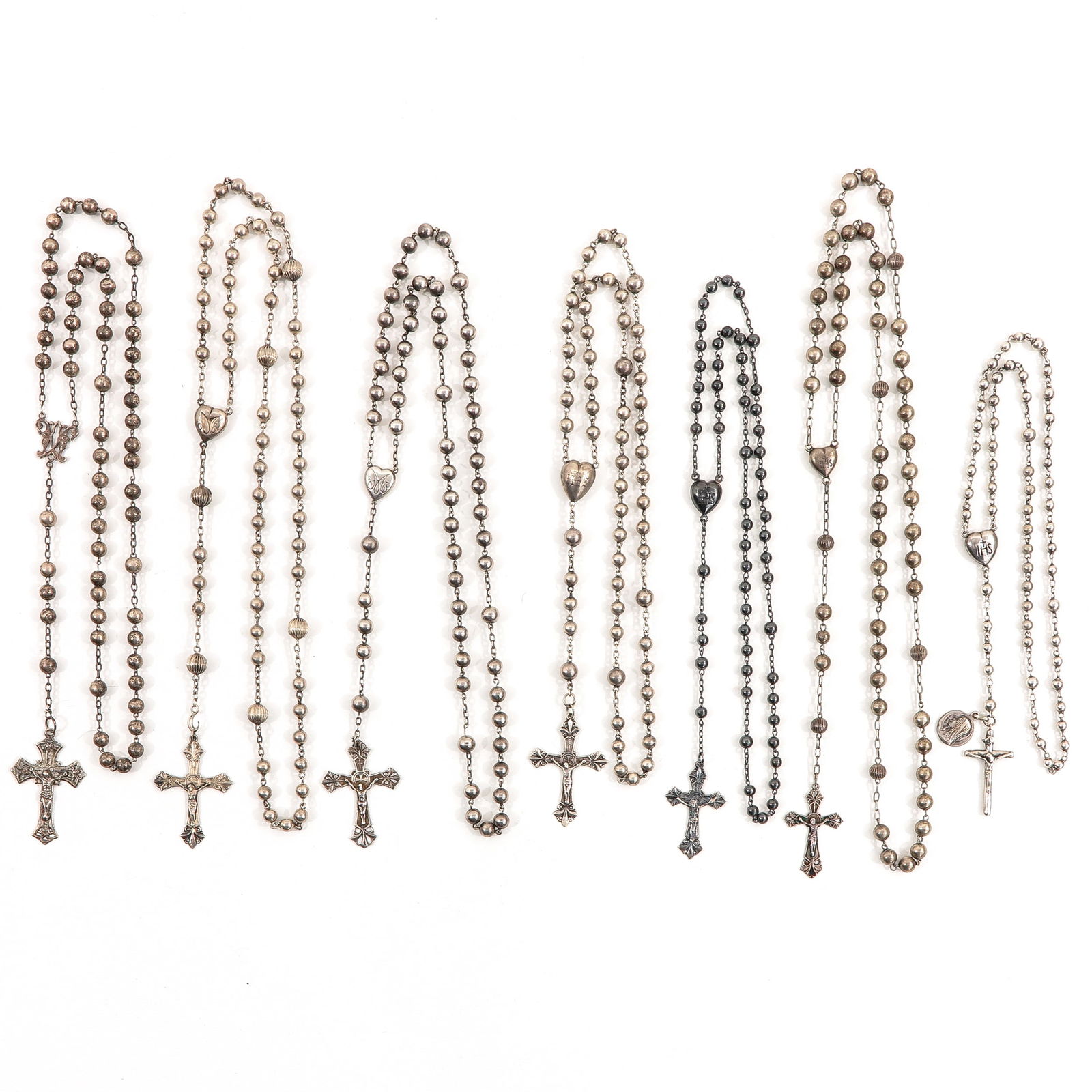 A Collection of 7 Silver Rosaries (1 of 5)