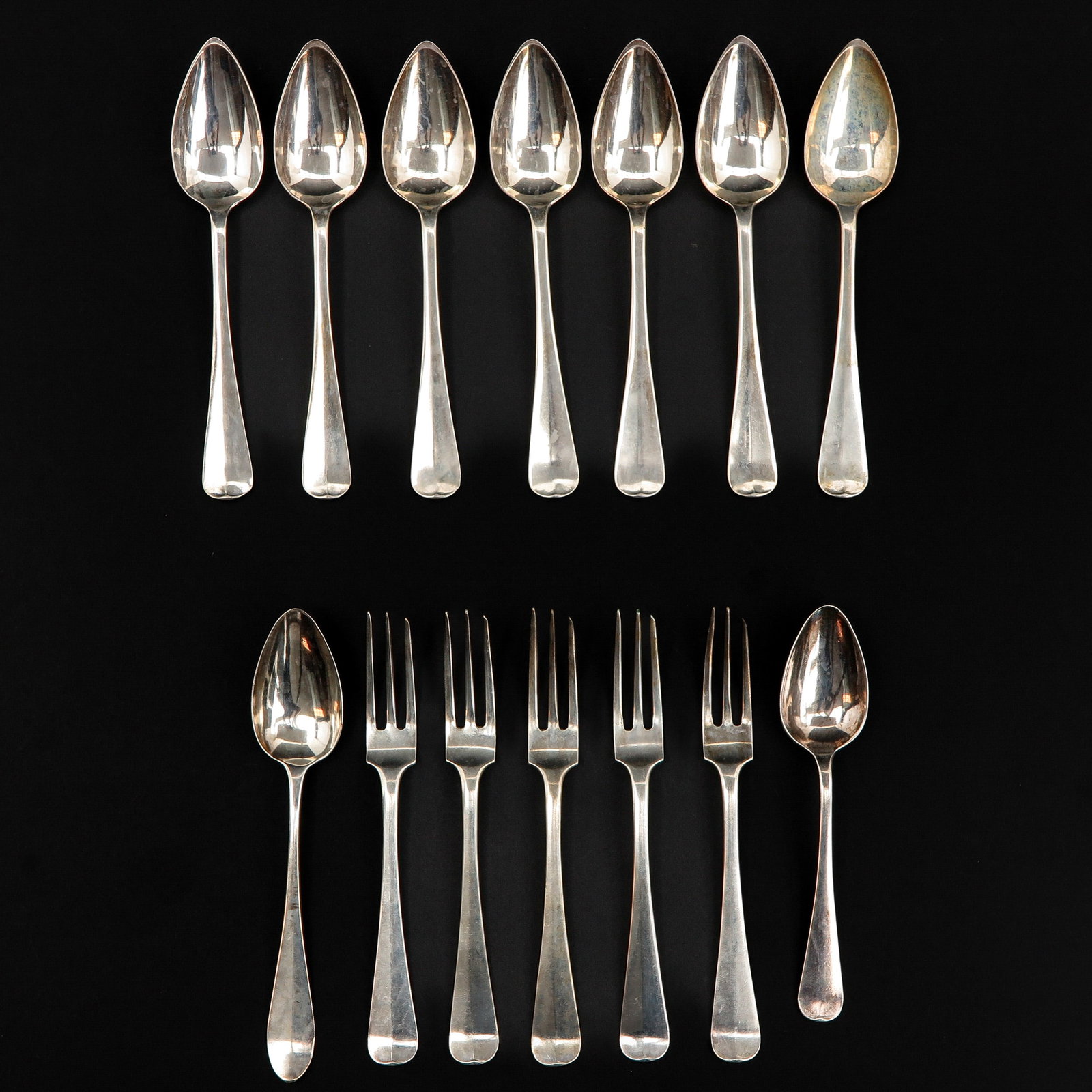 A Collection of 14 Pieces of Silver Cutlery: 2nd degree silver, including Van Kempen.