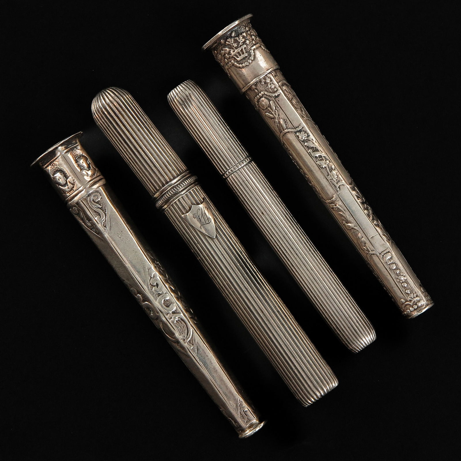 A Lot of 4 Silver Needle Cases: Including Amsterdam 18th Century, 9 cm. long.