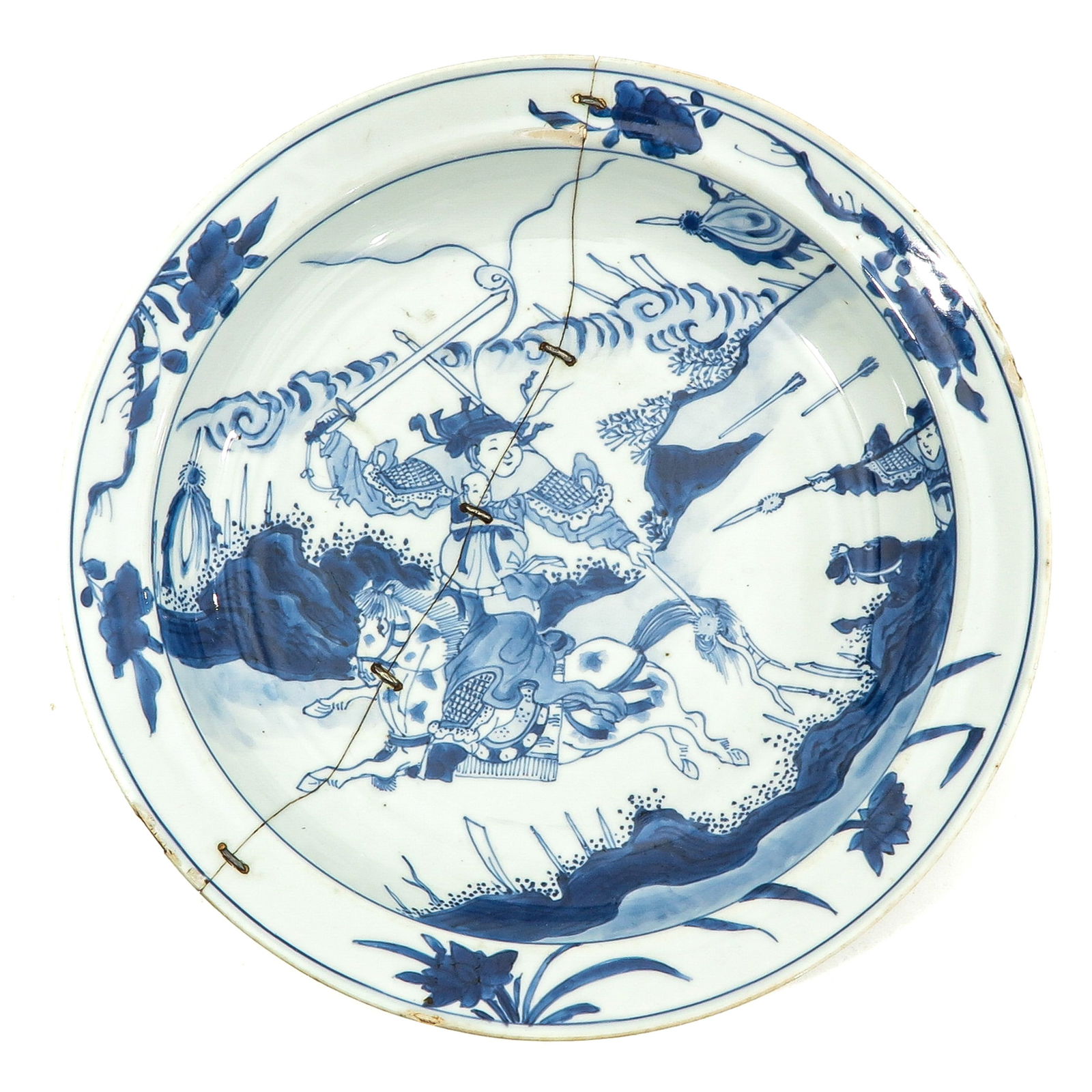 A Blue and White Plate: Decorated wtih scene of Romance of the Three Kingdoms, showing General Zhao Zilong saves Liu Beis son Ah Dou during the war against General Cao Cao. General Zhao Zilong is holding baby between his bre