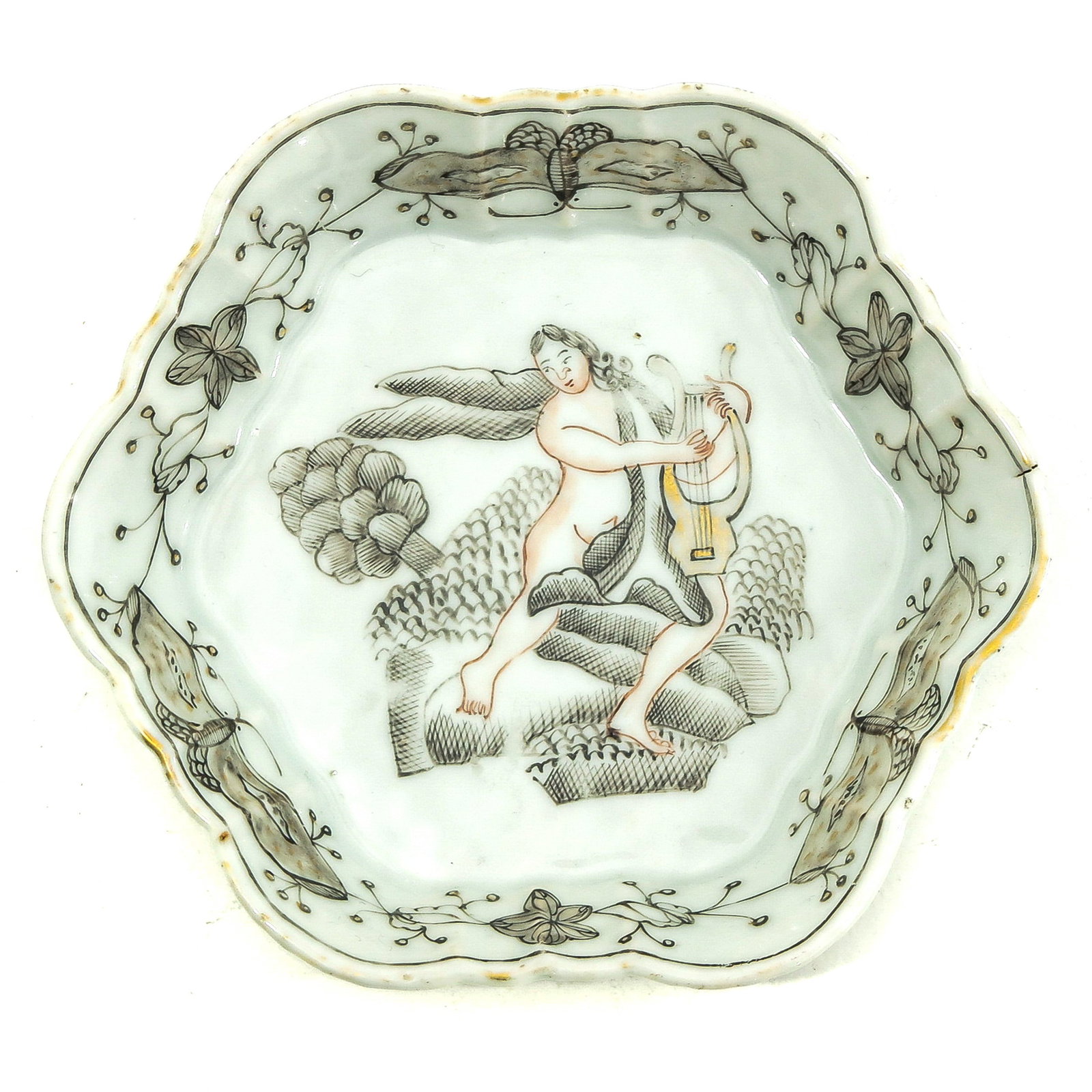 A Small Encre de Chine Tray: Depicting angel holding harp, 13 cm. in diameter.
