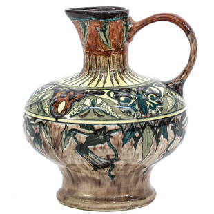 A Faience de Purmerend Pottery Jug: pottery, marked Faience de Purmerend, Wed. Brantjes & Co., floral decor, height 17 cm.