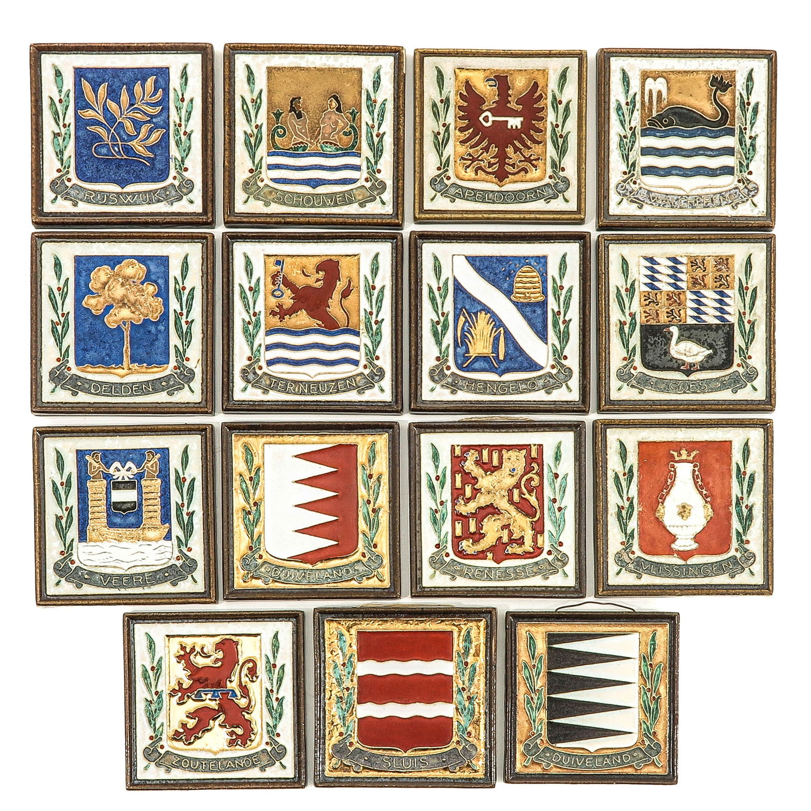 A Collection of 15 Tiles: consisting of 15 pieces of cloisonne coat of arms tiles, marked De Porceleyne Fles, including Duiveland and Zoutelande, 12 x 12 cm.