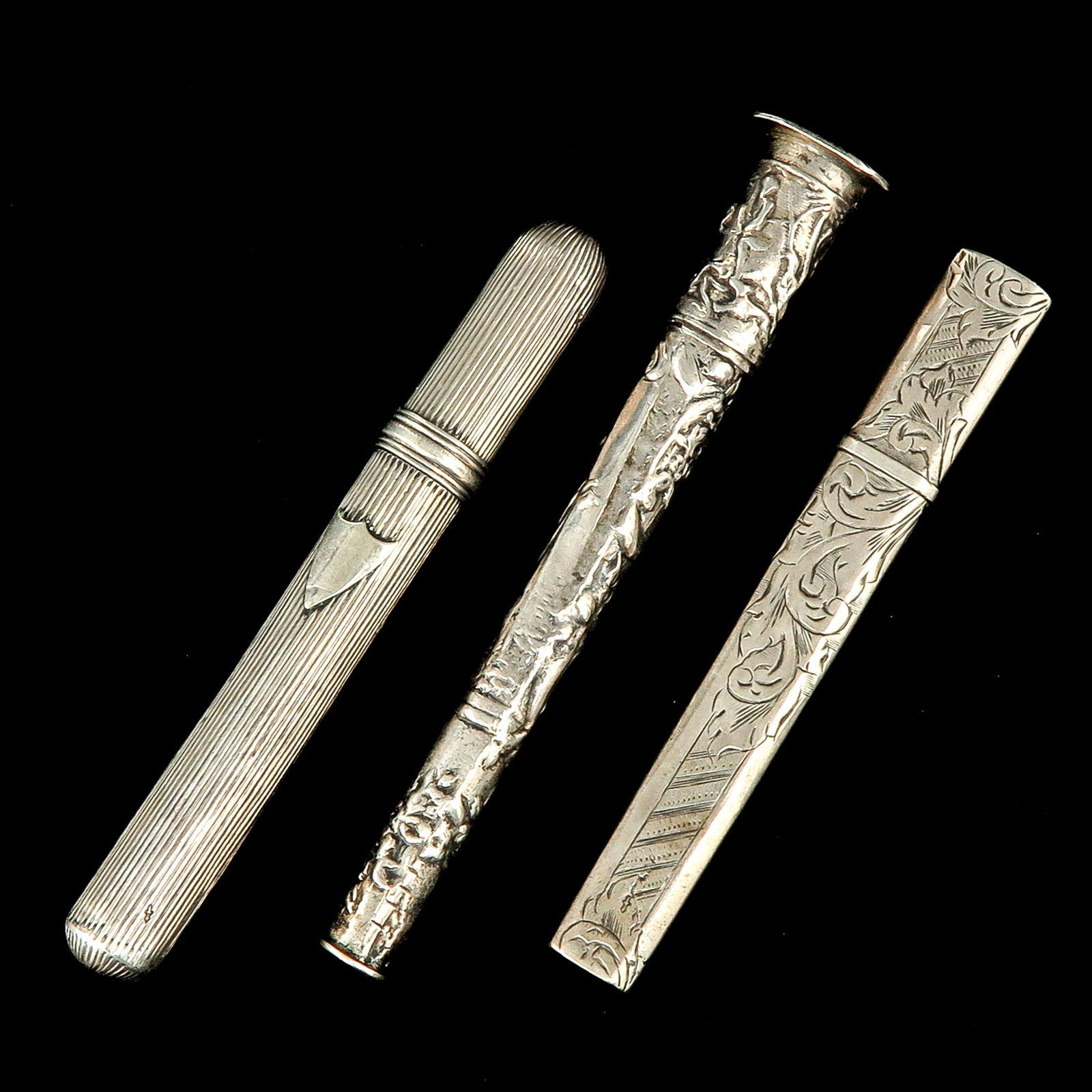 A Collection of 3 Silver Knitting Needle Cases: consisting of 3 pieces of silver needle cases, dating from the 18th century, unmarked, longest 103 mm.