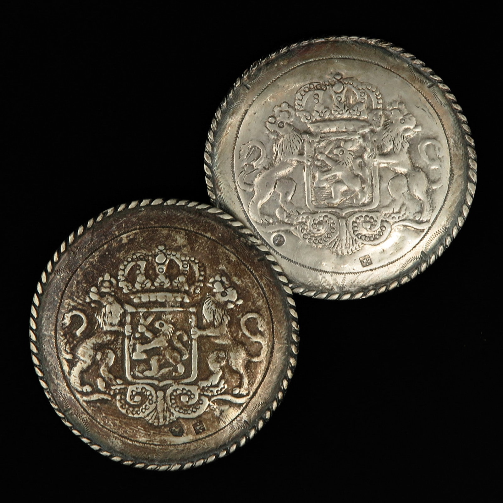 A Pair of Silver Broekstukken: Hallmarked Wendels Middelburg, ca. 1840, diameter 69 mm.
