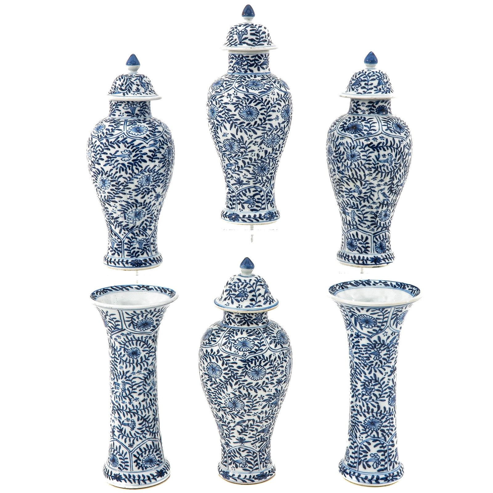 A Collection of 6 Garniture Vases: Blue and white floral decor, 18th Century, tallest vase is 23 cm. tall, in diverse conditions.