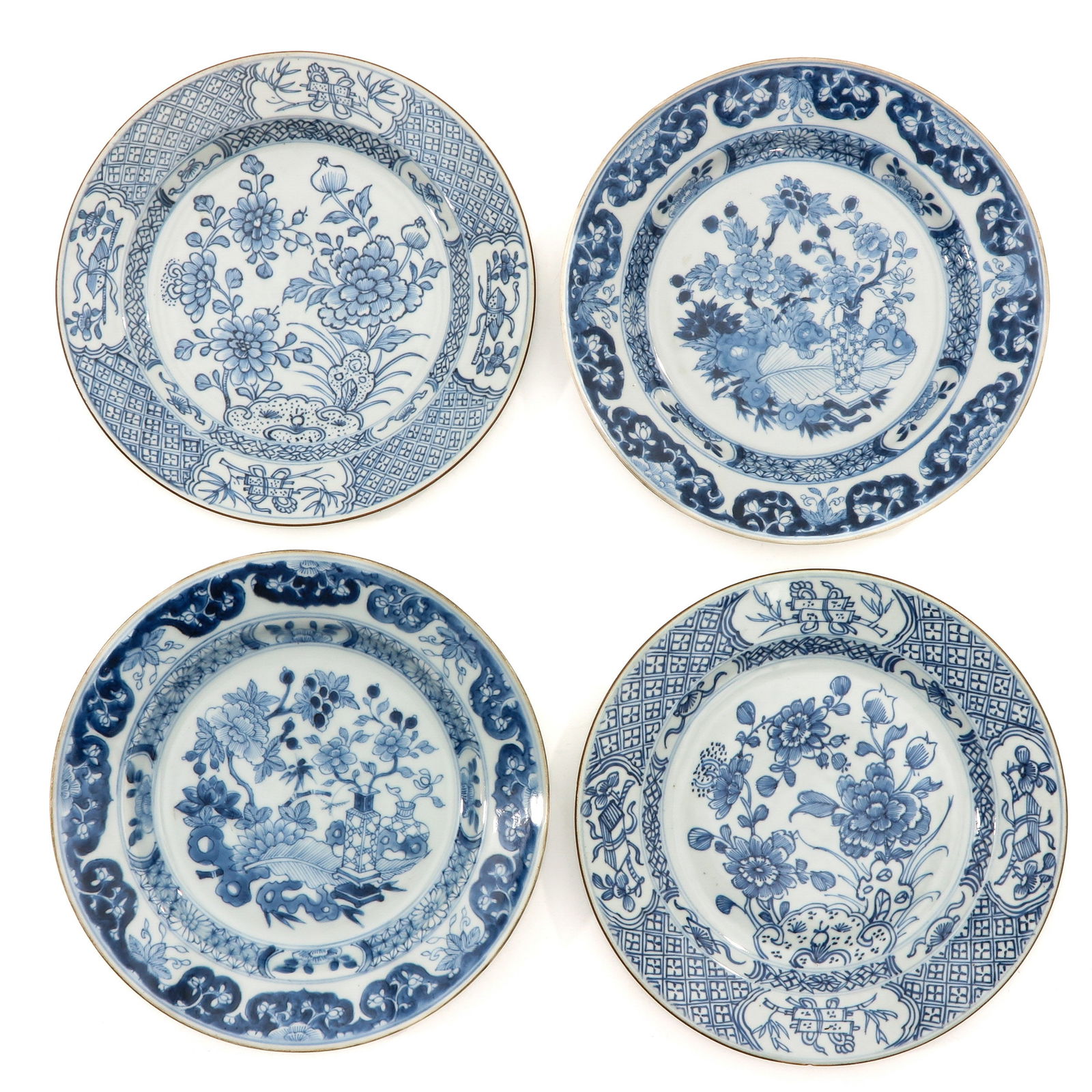 A Collection of 4 Blue and White Plates (1 of 10)