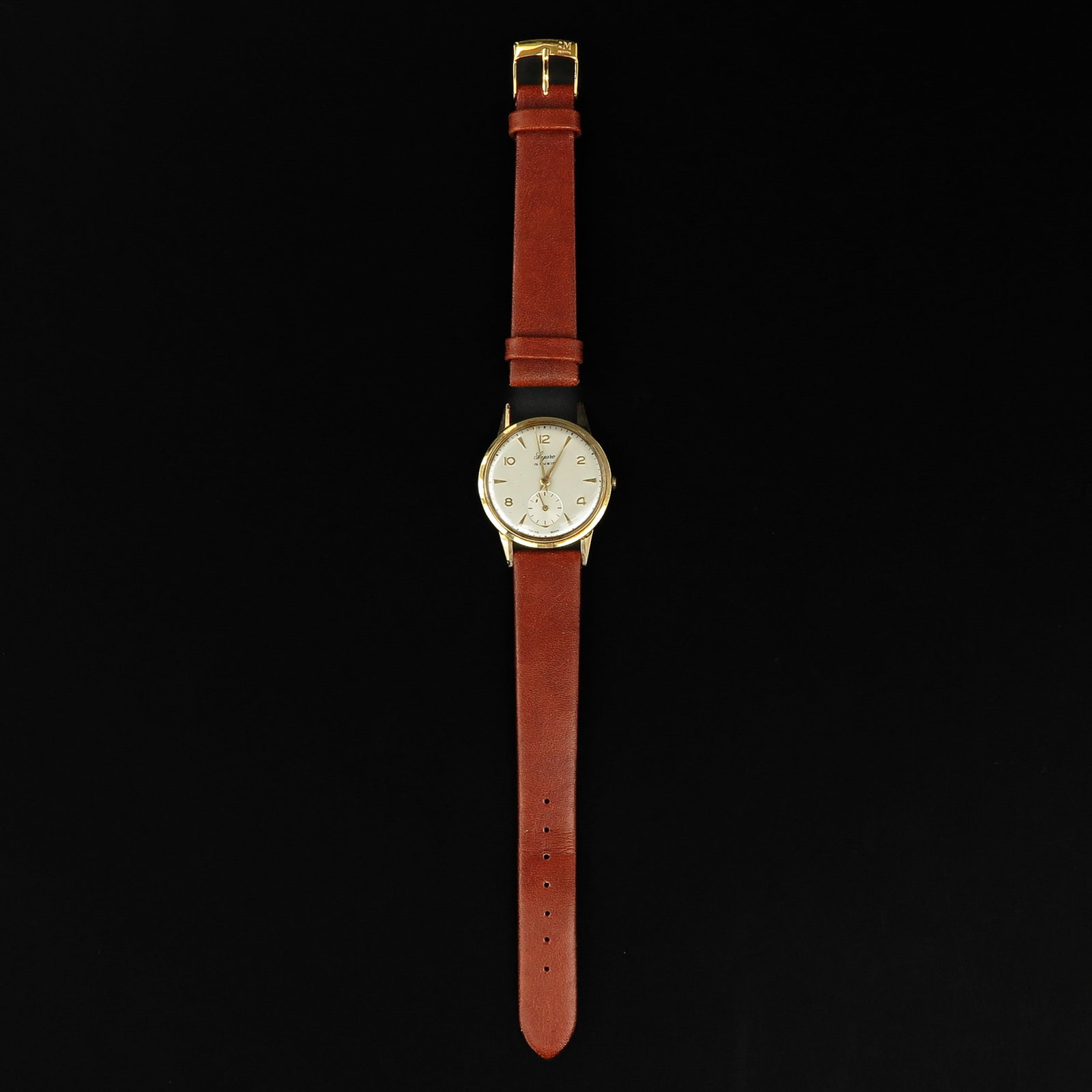A Mens Watch: Brand Soraro, 14k gold case, diameter 32 mm, on leather strap