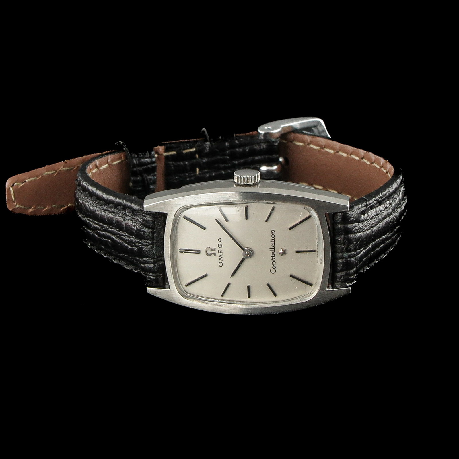 A Ladies Omega Watch: On leather strap, case length 31 mm.