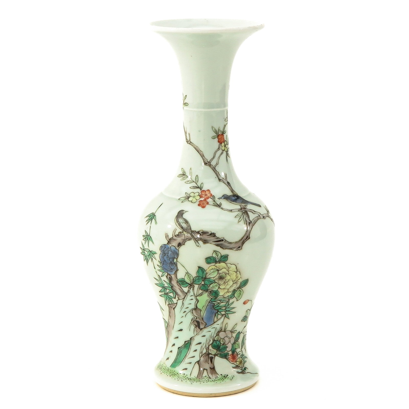 A Famille Verte Vase: Decorated with scene in garden of flowers and birds perched in trees, 26 cm. tall.