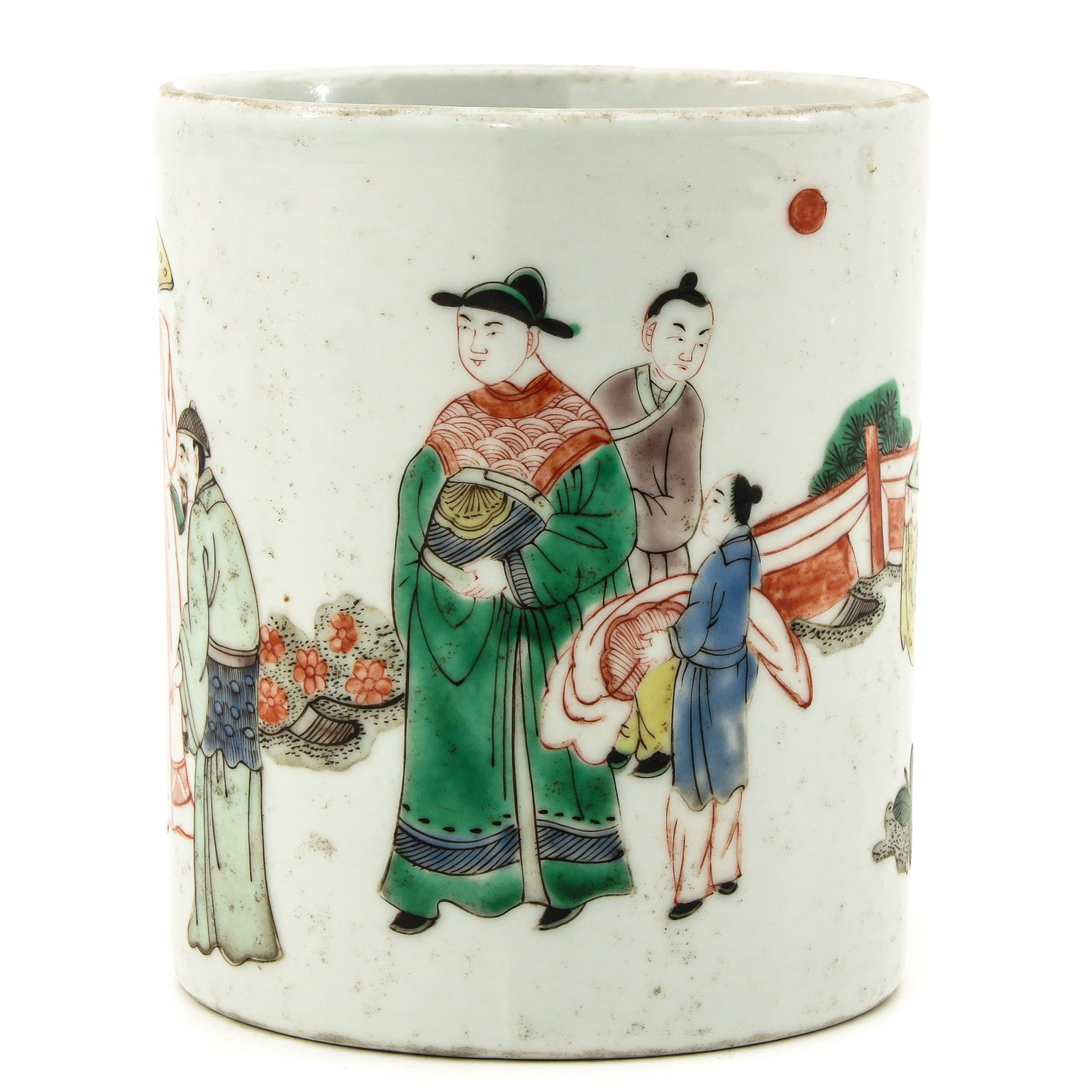 A Famille Verte Brush Pot: Depicting gathering of Chinese figures in garden, 12 cm. tall.