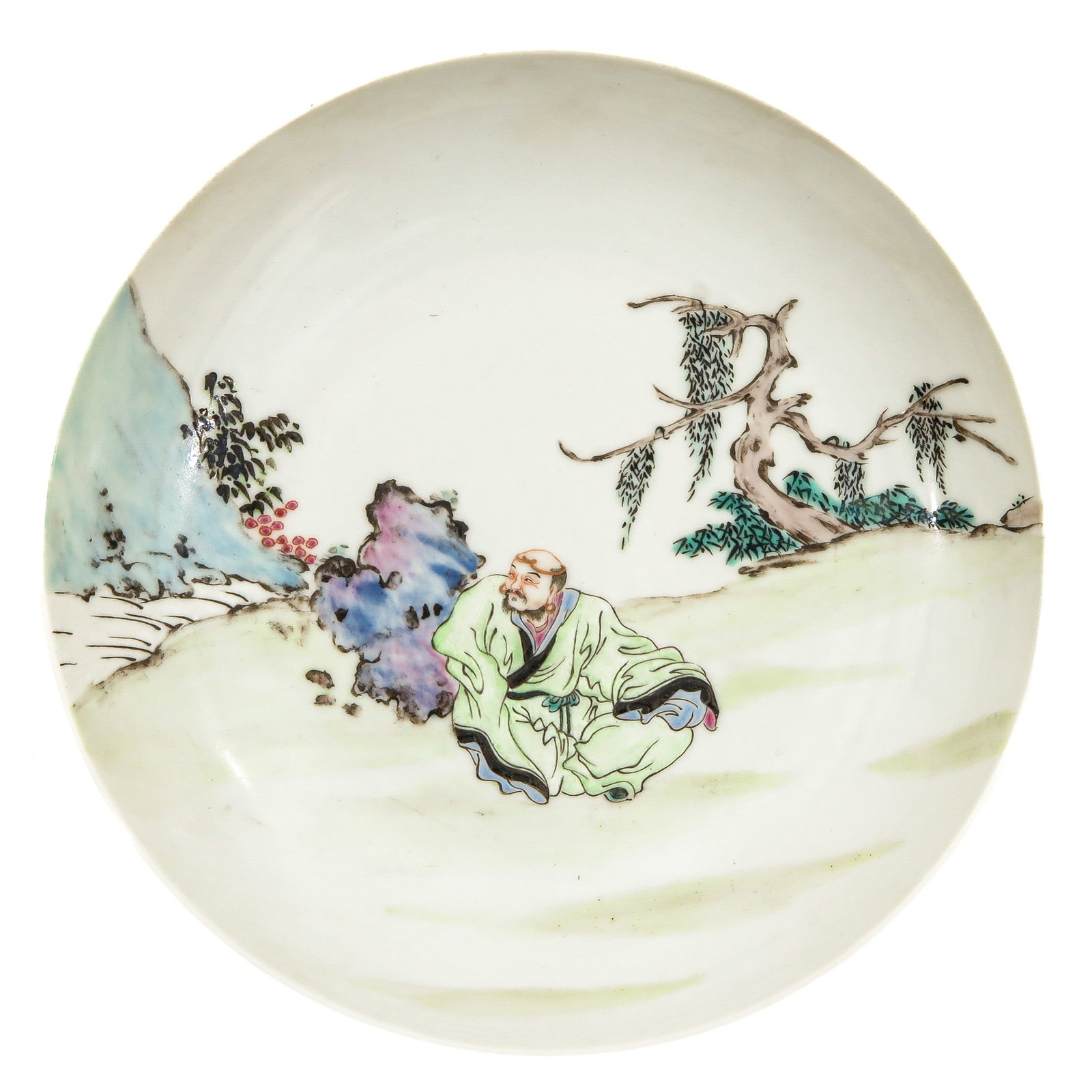 A Famille Rose Dish: Lime green back, depicting man sitting near rock, 16 cm. in diameter.